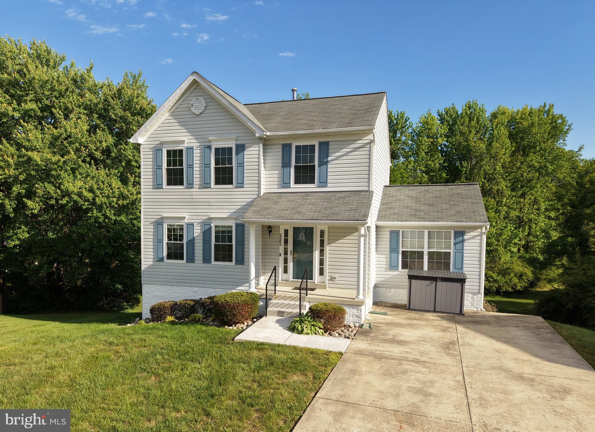 Nestled in the charming South Hampton community, this delightful Colonial home offers a perfect blend of comfort and style. With 1,760 sq. ft. of thoughtfully designed living space, this residence features three spacious bedrooms and two and a half bathrooms, ideal for both relaxation and entertaining. Step inside to discover a warm and inviting interior, highlighted by beautiful hardwood floors and carpet throughout. The combination dining and living area flows seamlessly into a cozy family room off the kitchen, creating an ideal space for gatherings. The kitchen boasts upgraded countertops, an island for additional prep space, and modern appliances, including a gas range and dishwasher, making meal preparation a joy. Enjoy the tranquility of your 0.31-acre lot, which backs to serene trees and is located on a peaceful cul-de-sac. The outdoor space features a welcoming porch and deck, perfect for morning coffee or evening relaxation. The South Hampton community is known for its friendly atmosphere and convenient access to local parks, schools, and public services. With easy access to shopping and dining, everything you need is just a short drive away. This home is not just a place to live; it's a place to create lasting memories. Experience the comfort and community spirit that South Hampton has to offer! Schedule your private tour today.