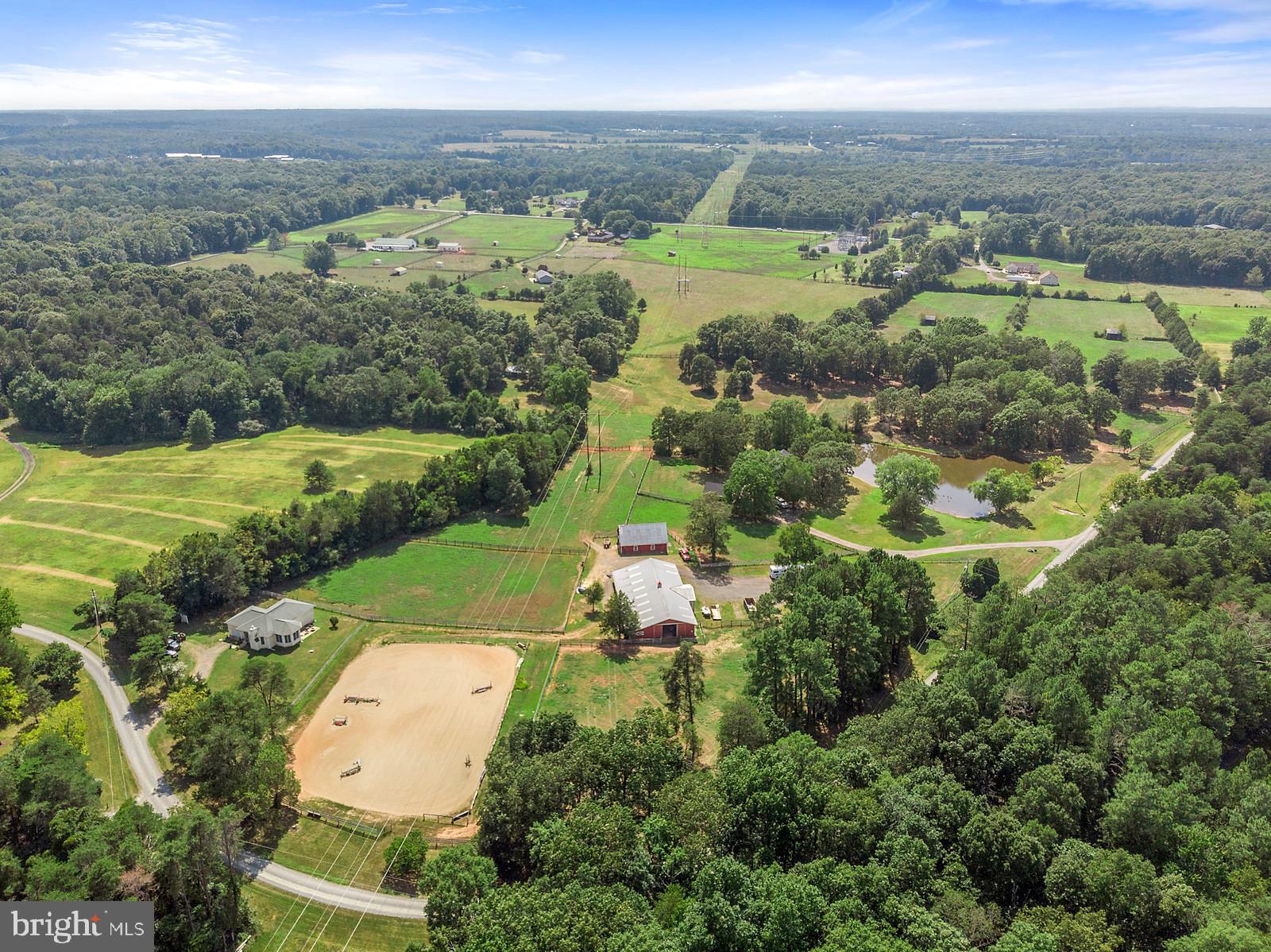AWESOME HORSE PROPERTY!  Great location for horse people convenient to all the major shows (Commonwealth, Upperville, Middleburg, Rosemont, Warrenton) & in the middle of hunt country (close to Warrenton, Casanova & Rappahannock hunts) Brick colonial with wonderful front porch overlooking pond and cute 2 BR, 1 BA cottage on 25 acres. Working Show Horse Farm with12 stall center aisle barn plus 8 outside stalls, wash stall, hay storage, large tack room, feed room, bath and laundy. Second barn currently used for dog training that has a/c and heat. Wonderful riding ring, fenced pastures for grazing, run in sheds, fine country living!