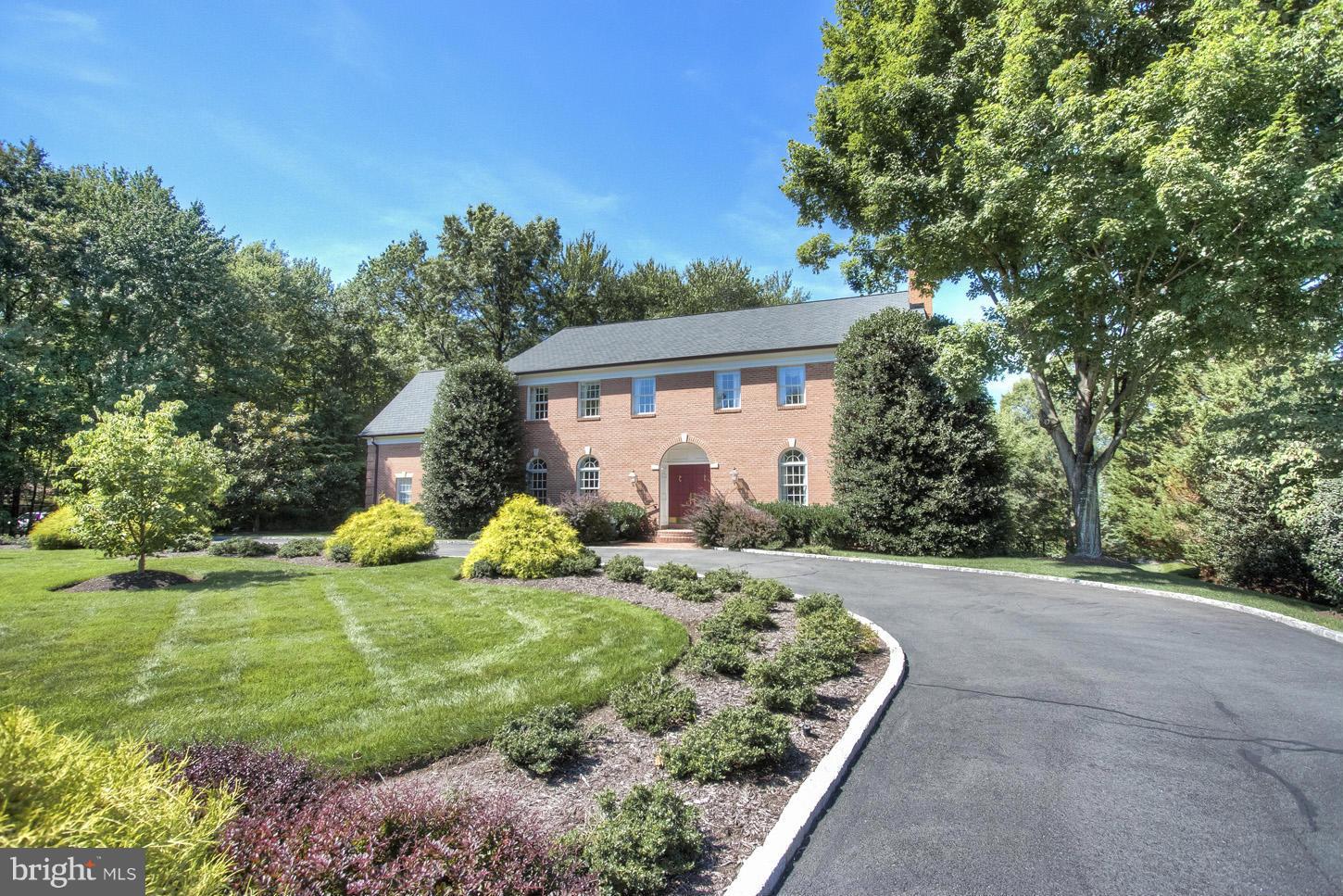 INCREDIBLE PRICE & OPPORTUNITY TO LIVE IN SOUGHT AFTER SUMMERWOOD.   STATELY ORIGINAL OWNER COLONIAL ON A LARGE LOT * LOADS OF UPGRADES* WITHIN A MILE OF THE NEW TYSONS METRO * NINE FOOT CEILINGS * RICH MOULDINGS * ARCHED DOORWAYS* HARDWOODS ON ALL 3 LEVELS * FRONT & REAR STAIRS* CIRCULAR DRIVE & 2-CAR SIDE- LOAD GARAGE