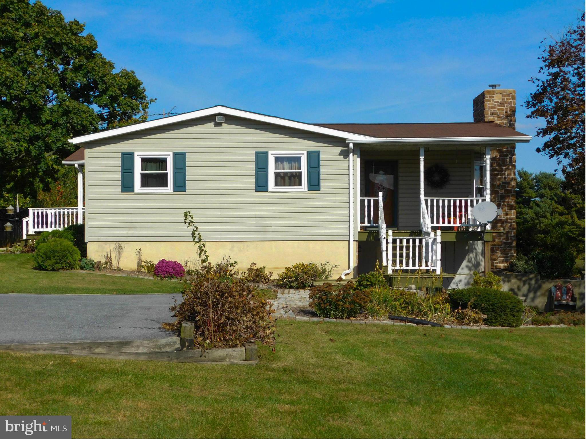 Country Living at it's best! Privacy with convenience! Rancher on over 1 acre with 2-Car Oversized Detached Garage. Roof is two years old, Windows are 3 years, and Heat Pump is 4 years! This home has been cared for and loved! Lower level Master, walk-in closet & Full Bath,above ground pool for summer enjoyment! Recently painted! Coal & Pellet Stove! Pack your bags and call this your New HOME!