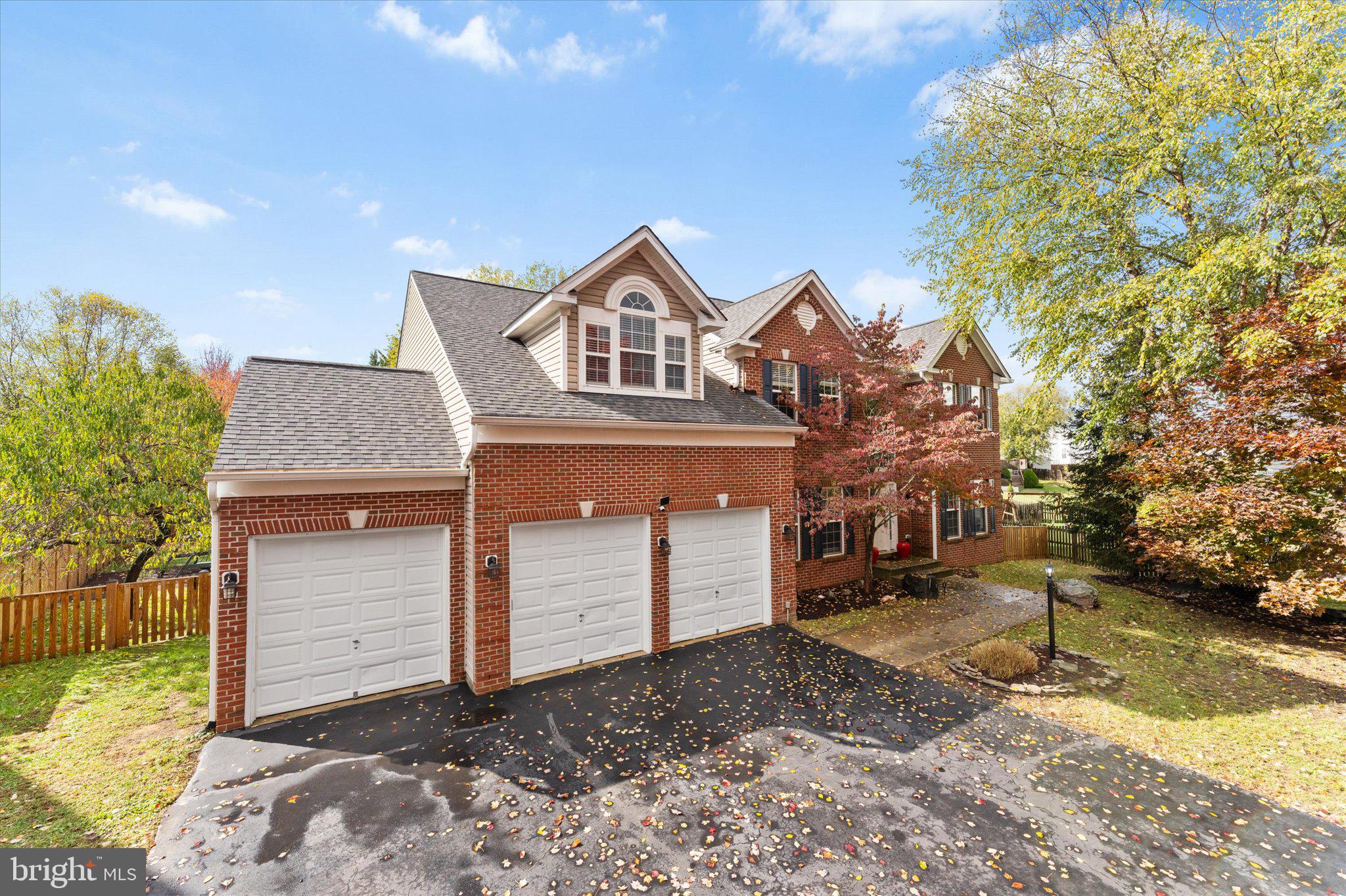 Welcome to this exceptional Colorado model home perfectly situated on a premium cul-de-sac lot in the heart of Purcellville! Featuring a rare 3-car garage, a superb flat backyard, and a spacious driveway, this property offers the ideal blend of luxury, comfort, and practicality. Lovingly maintained by the original owners, the home has been pet-free and smoke-free, ensuring pristine condition throughout.

Step into a grand two-story foyer that opens to an expansive, light-filled layout with bump-outs in the family room, kitchen, and office. The two-story family room showcases a stunning floor-to-ceiling stone fireplace — the perfect centerpiece for gatherings large or small. The gourmet kitchen impresses with abundant cherry cabinetry, new quartz countertops with a large undermount sink, brand-new GE refrigerator, GE convection wall oven with Wi-Fi connectivity, and a 34" five-burner cooktop on a spacious island. A second stairway conveniently connects to the upper level, and multiple dining options include a formal dining room and casual seating at the island or breakfast area.

Upstairs, the airy owner’s suite features a vaulted ceiling, sitting area, and a luxury ensuite bath with two walk-in closets, dual vanities, soaking tub, and separate shower. Each secondary bedroom offers its own walk-in closet, with three full bathrooms upstairs providing exceptional convenience.

Recent upgrades include wide-plank luxury flooring (7.5mm rigid core, 22mil wear layer, QuietWalk underlayment) on the main and upper levels, fresh neutral paint, roof (2020)with 40-year shingles, 6” gutters and oversized downspouts, upper-level HVAC (2021), and water heater (2019). Updated bathrooms showcase new counters, sinks, fixtures, mirrors, and lighting.

A fully finished basement offering the perfect space for a recreation room, home gym, media room, guest suite, or play area. Outside, enjoy a new outdoor patio (14x20) and gazebo (12x18) on over one-third of an acre with mature landscaping, balanced shade, fruit trees, and a thriving raspberry patch. The large, flat yard and extended driveway provide the perfect space for basketball, scooters, or outdoor play.

Located in a sought-after community close to charming downtown Purcellville, this home truly has it all — space, updates, and an unbeatable setting!