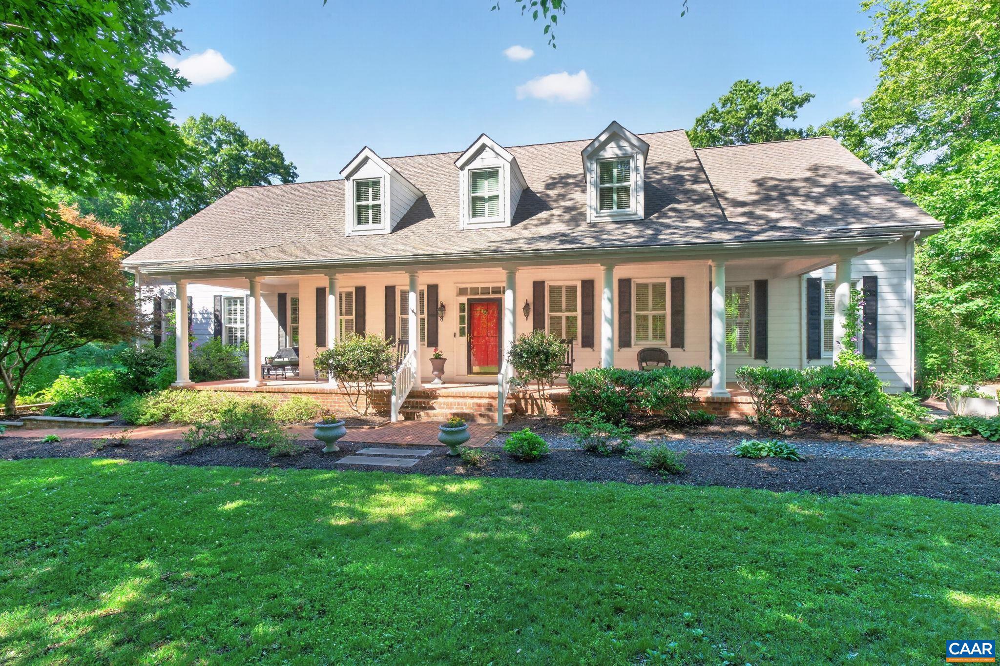 Located in Hidden Hills, one of Keswick?s most desirable communities, this charming property features five bedrooms, a first-floor primary suite, and a vaulted great room with a two-story stone fireplace. The picturesque lot offers 4.76 acres of privacy, mature landscape, and perennial gardens of native Virginia plants, all a stone?s throw from miles of community walking and riding trails. The renovated kitchen features updated cabinetry, countertops, and appliances, while the adjoining breakfast nook has a new picture window, lighting, and paint. There is a formal dining room, a private study with built-in cabinetry and shelving, a dramatic foyer, and a two-car garage. Upstairs, a second suite is complemented by three additional bedrooms. Outdoor living is equally impressive, with a spacious screened porch and expansive Trex deck. Firefly high-speed fiber internet provides exceptional connectivity, while Charlottesville, Pantops, Zion Crossroads, and Spring Creek are close by, and Richmond International Airport is less than an hour away. Don't miss a terrific blend of convenience and privacy in a well-loved, well-maintained home.,Solid Surface Counter,White Cabinets,Fireplace in Great Room