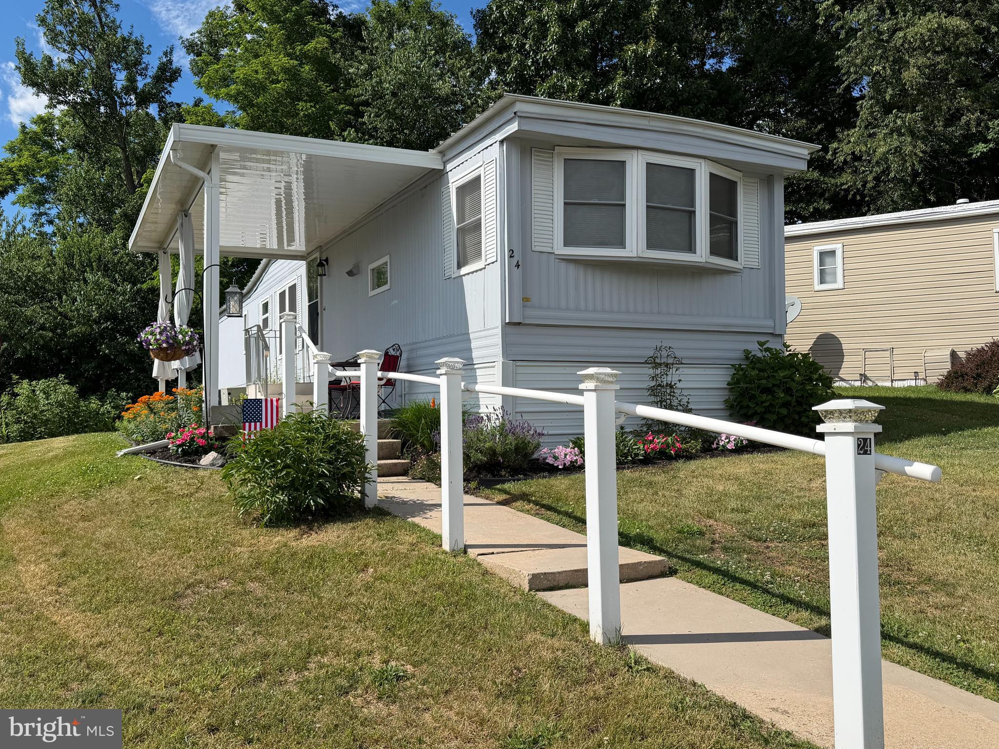 Welcome to easy living in Swatara Mobile Home Park, a desirable 50+ community! This well-maintained, fully furnished 3-bedroom, 1-bath home offers comfortable one-floor living with an eat-in kitchen, spacious living room with electric fireplace, and numerous updates throughout. Recent improvements include new luxury vinyl plank flooring, replacement windows (2022 & 2024), new water heater (2024), oil furnace (2021), central A/C (2019), updated plumbing, newer awning, skirting, doors, and more. Outside, enjoy attractive landscaping, a newer metal roof (2019),  and a storage shed with electric. Washer and dryer included. Monthly lot rent of $470 includes water, sewer, and snow removal. Move-in ready and waiting for its next owner! Buyer must be approved by park management.