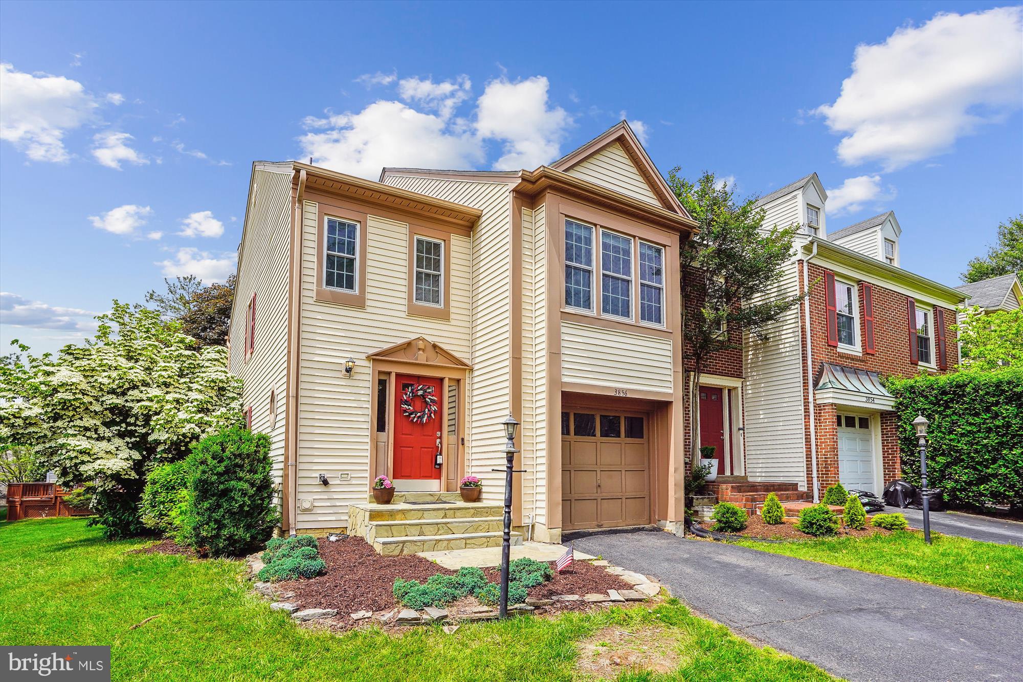 Fully updated, End Unit Townhome with attached garage!  Open 2-story foyer!  Boasting 3 bedrooms and 4 total bathrooms on 3 finished levels.  Roof and Skylights New in 2022.  HVAC and Water Heater new in 2018.  Remodeled Kitchen with new cabinets, granite countertops, raised ceiling, recessed lighting, backsplash and more.  Updated bathrooms!  Vaulted ceilings in upper level with new skylights allowing abundant natural light to pour in.  Open upper level to lower level.  Primary bedroom with en suite and walk-in closet with built-ins!  Modern touches throughout.  Wood-burning fireplace.   Real hardwood floors throughout on main level.