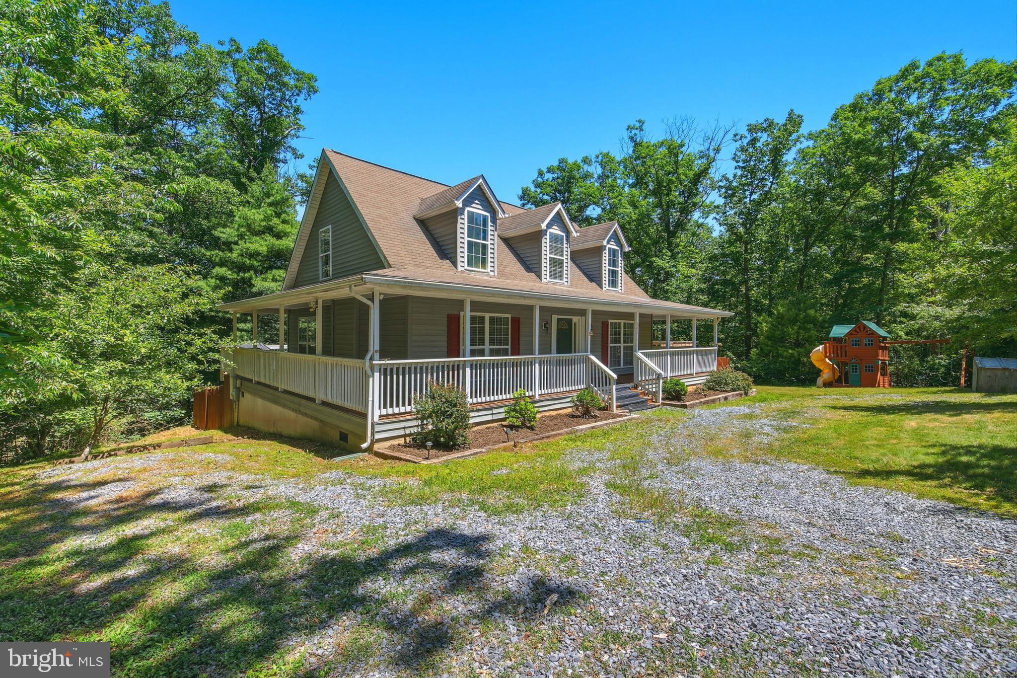 " Willow Haven" Fenced back yard! Looking for an easy to maintain mountain getaway or full time home with plenty of outdoor level space? This bright 3BR/2.5BA welcoming two-level Cape Cod offers a comfortable layout, a level yard, and outdoor amenities that are hard to find.
The main level features an inviting living and dining area, a kitchen with bar seating for casual meals and conversation, and a spacious primary suite with a walk in closet and full bath. The laundry room is conveniently located on the main level and includes a half bath. Upstairs, you'll find two generously sized bedrooms, a full bath, and a cozy reading nook that is perfect for relaxing with a good book.
Outside is where this property truly shines. The fenced yard provides plenty of room for children, pets, gardening, or entertaining. If you've been searching for a flat yard in the mountains, this one deserves a look. Enjoy your morning coffee on the covered wraparound deck, gather with friends in the yard, or escape to the property's most unique feature: a detached shed that has been transformed into a private media room. Complete with movie theater style recliners with cupholders, a popcorn machine, power, and a heat pump mini split for year round comfort, this space is designed for movie nights, game days, and making memories with family and friends. The room has been darkened to create an authentic theater experience with special lighting right in your own backyard. A circular driveway makes coming and going easy while providing plenty of additional parking for guests.
Offered furnished with an acceptable offer, this home is ready to enjoy from day one. Located on paved roads and less than 10 minutes from Bryce Resort, you'll have easy access to skiing, snow tubing, mountain biking, golf, hiking, swimming, pickleball, tennis, and more. Whether you're looking for a weekend retreat, vacation home, or full-time residence, this property offers the perfect combination of comfort, convenience, and fun.
