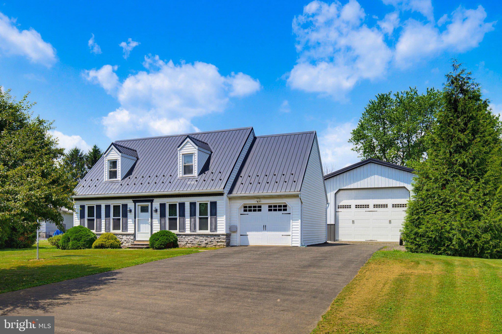 Charming Cape Cod with Exceptional Outbuilding in Solanco School District!  This Cape Cod home offers 4 bedrooms and 2 full bathrooms, providing plenty of room for family living. The lower level presents endless possibilities for additional living space, a recreation area, home office, or workshop.   Recent updates include newer windows, doors, and a durable metal roof, adding both comfort and peace of mind. An attached one-car garage provides convenient everyday access.  A standout feature of this property is the impressive 40' x 24' pole barn with a 16-foot overhead garage door and reinforced concrete floors. Whether you're a car enthusiast, collector, contractor, or hobbyist, this versatile building offers exceptional space and functionality for a wide range of uses.   Located within the Solanco School District, this unique property combines comfortable living with outstanding storage, workspace, and hobby opportunities. Don't miss your chance to make it your own!