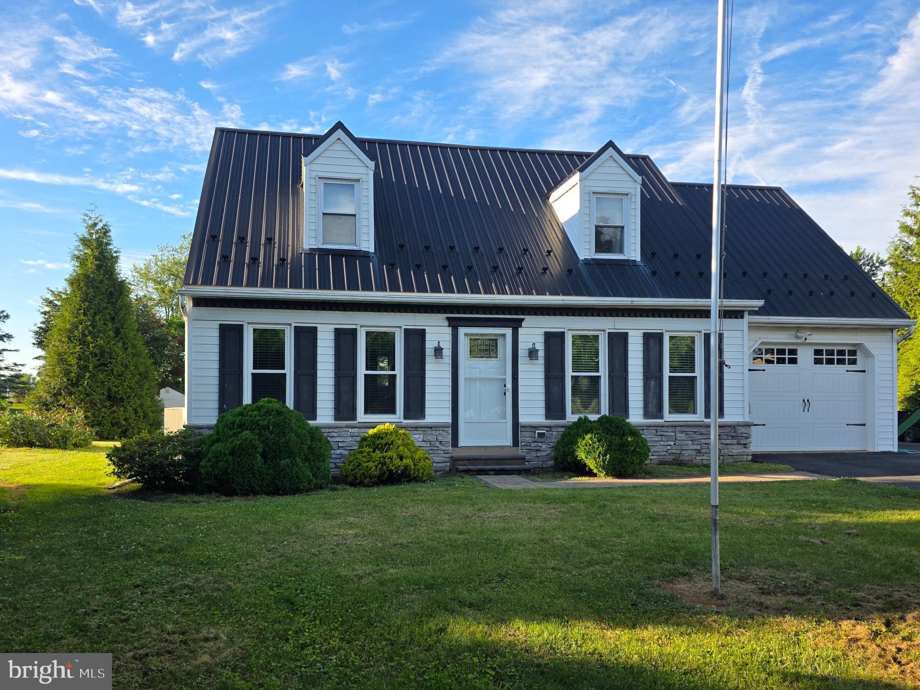 Charming Cape Cod with Exceptional Outbuilding in Solanco School District!  This Cape Cod home offers 4 bedrooms and 2 full bathrooms, providing plenty of room for family living. The lower level presents endless possibilities for additional living space, a recreation area, home office, or workshop.   Recent updates include newer windows, doors, and a durable metal roof, adding both comfort and peace of mind. An attached one-car garage provides convenient everyday access.  A standout feature of this property is the impressive 40' x 24' pole barn with a 16-foot overhead garage door and reinforced concrete floors. Whether you're a car enthusiast, collector, contractor, or hobbyist, this versatile building offers exceptional space and functionality for a wide range of uses.   Located within the Solanco School District, this unique property combines comfortable living with outstanding storage, workspace, and hobby opportunities. Don't miss your chance to make it your own!