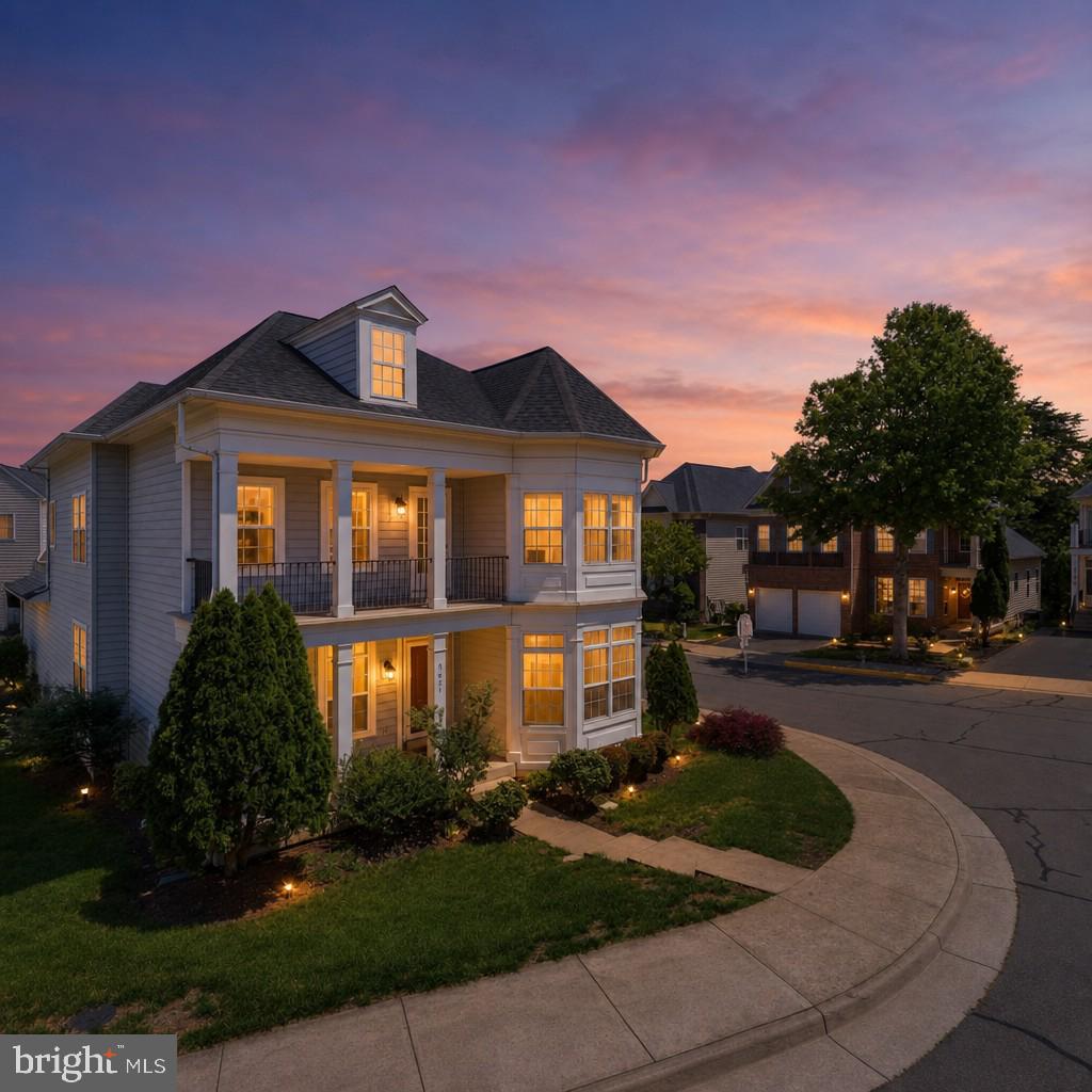 This stunning Bladen model by Airston Homes offers an exceptional blend of extended living space and functional design across three finished levels totaling 3,474 sq. ft. in the highly desired Sumner Lake community. Perfectly positioned directly across from the lake, the home provides convenient access to three VRE stations, Routes 66/28/29, PW Parkway, The Yard, and nearby shopping and dining.  A three‑level extension enhances the interior, adding valuable square footage throughout. The main level features a formal living room with extension, formal dining room, breakfast room, family room, half bath, and an open kitchen with new LVP flooring (2026). The upper level includes an owner’s suite with luxury bath and walk‑in closet, three additional bedrooms, a full hall bath, and access to the north‑facing verandah.  The finished lower level offers a spacious great room ideal for gatherings, an expansive storage area, and a 3‑piece rough‑in for a future full bath.  Exterior highlights include a welcoming front porch, rear deck, and a 2‑car rear‑load garage.  Recent updates: HVAC & furnace (2022), dryer (2020), hot water heater (2020), toilets (2020), newer carpeting on main level, and a new stainless‑steel kitchen appliance package (2026).   Residents of Sumner Lake enjoy a beautifully maintained community featuring a clubhouse with pool, walking paths with exercise stations, gazebo, and lake overlook, enhancing the appeal of this sought‑after neighborhood.
