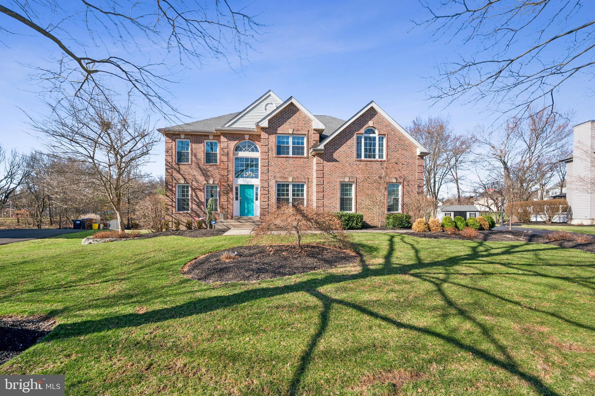 Welcome to this exquisite center-hall Colonial, nestled on a quiet cul-de-sac in the desirable Lower Makefield Township. Set on a beautifully landscaped, private lot with panoramic views, this home offers both tranquility and elegance.

Upon entering, you are greeted by a grand two-story foyer with a striking palladium window, leading to a spacious dining room and a well-appointed first-floor study. The home features gleaming hardwood floors and newly installed luxury carpeting throughout, enhancing the overall appeal.

The gourmet kitchen is a chef’s dream, with custom cabinetry extending to the ceiling, soft-close drawers, stainless steel appliances, and stunning marble countertops. A greenhouse window adds natural light, while the large island offers ample seating for entertaining. Recessed lighting further highlights the kitchen's beauty and functionality.

The expansive two-story great room is the heart of the home, featuring a cozy fireplace and an abundance of natural sunlight pouring in through large windows. A second staircase provides convenient access to the upper level.

The luxurious primary suite is a private retreat, boasting a cathedral ceiling, a spacious walk-in closet, and a cozy sitting area. The spa-like en suite bathroom includes an expanded shower with a frameless glass surround, new tile flooring, and dual vanities, offering a serene space to unwind.

The fully finished basement provides additional living space, with plenty of room for storage and recessed lighting, offering flexibility to suit your needs.

The outdoor living area is perfect for relaxation and entertainment, featuring a custom deck with a retractable awning, a shed, and picturesque views that complete the serene setting.

Conveniently located within the award-winning Pennsbury School District, this home offers easy access to major highways, Makefield Highlands Golf Course, public transit, airports, hospitals, shopping, and world-class dining.