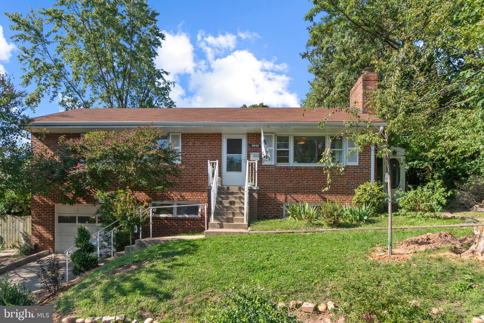 Location! Location! The little updated gem of a home will be ready for new tenants, available 5/1/25! Main level with hardwood floors & neutral paint features 3 bedrooms, 2 renovated bathrooms, living room with fireplace and eat-in kitchen. The enclosed porch off kitchen leads to a terraced flagstone patio in back. The single car front loading garage opens to lower level recreation room with fireplace, 1 renovated bathroom & utility room with laundry hookup & walkup exterior exit to fenced backyard. The rec room has been used as 4th bedroom by previous tenants. Metro, shopping & restaurants close by.  Yorktown school pyramid. Pet(s) welcome.  24+ month lease preferred ***Photos taken from previous tenant occupancy***