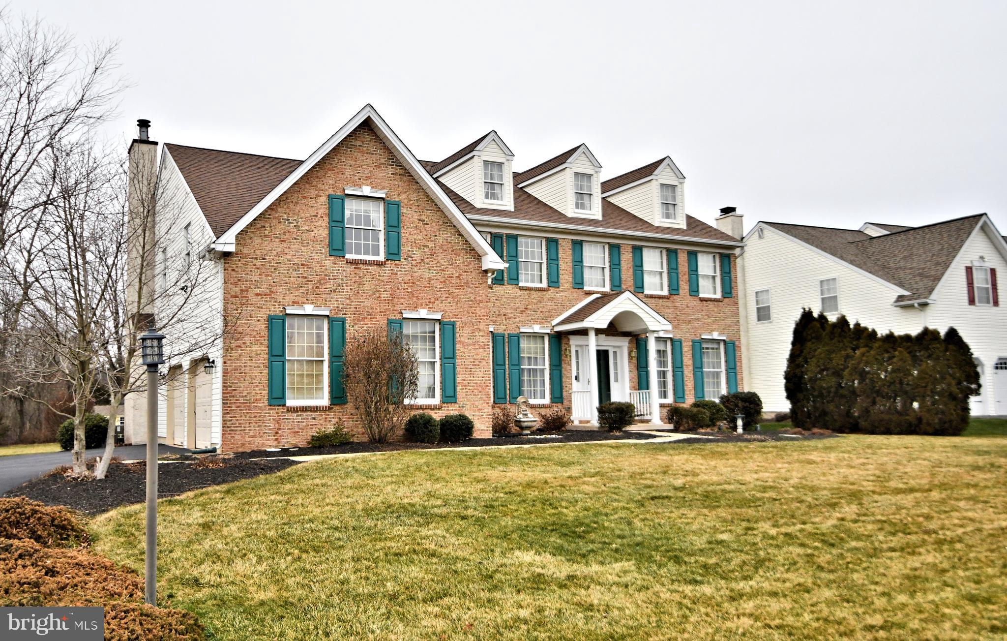 Welcome to your new home in the beautiful Bridgeview Drive. As you enter the front door you will notice the home office with built in bookshelves. The kitchen is filled with stainless steel appliances, tile flooring, Corian counter tops, and a tile back splash. The first floor has hardwood floors throughout, a brick fireplace in the living room, and a formal dining room. Upstairs you will find four bedrooms, a full bath, and a spacious main bath. The main bedroom features two sitting rooms, two walk in closets, vaulted ceilings and the main bath. The gorgeous main bath offers a  jacuzzi tub, stand up shower, and a granite vanity top. The home also contains a large unfinished basement and 2 garages. Out back you will find a spacious back yard with a large patio and deck. Schedule your showing asap! Multiple Offer Scenario. Highest and Best due by Monday 5:00PM on 1/22