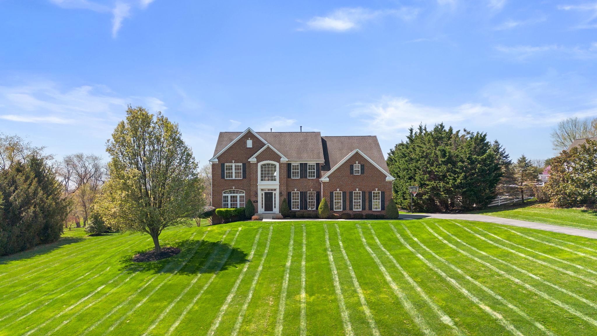 Offer Deadline: Tuesday, April 21, 2026 at Noon. Bring your best and final.

Welcome to this turnkey 4BR/3.5BA home with over 5,000 finished sq. ft on a premium 2.15-acre lot backing to hole #2 in the highly sought after Challedon golf course community.

Offering an exceptional floor plan with a light, bright, open feel. Features include hardwood floors throughout the main level, new carpet in bedrooms, and a fully remodeled kitchen and baths with high-end finishes.  Coffered ceilings, detailed trim work, and high-end moldings and millwork add character and craftsmanship throughout.
The finished walk-out lower-level basement has a large rec room and a workout room.  A water filtration system was recently added.  

This home is in immaculate condition throughout with a clean, modern design. Private setting with beautiful golf course views—move-in ready.
