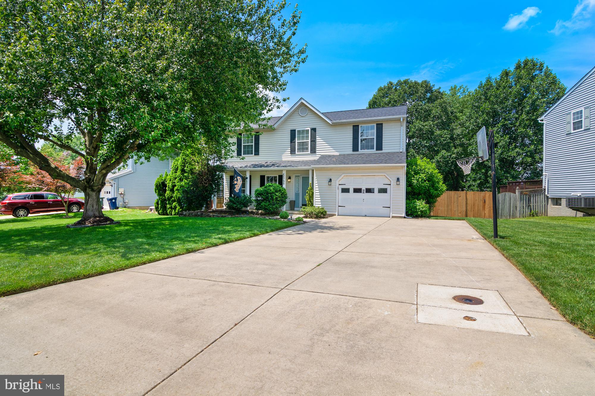 4-bedroom, 2 full and 2 half bath Colonial in Eldersburg Estates featuring three finished levels, a spacious bedroom level, and a front-entry garage. The main level offers an inviting layout for daily living and entertaining, complemented by a convenient powder room. Upstairs, four bedrooms and two full baths provide plenty of private living space. The finished lower level adds a second half bath and room for a recreation area, home office, gym, playroom, or media lounge. A concrete driveway accommodates up to four vehicles in addition to the garage, providing exceptional parking. Conveniently located near Becket Road, this well-kept Eldersburg home combines a versatile floor plan, generous living space, and everyday convenience.