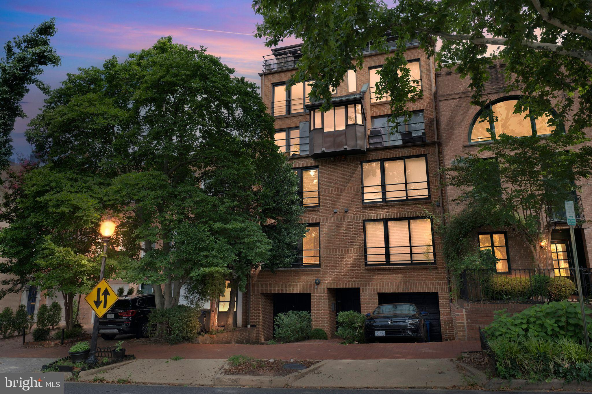 Renovated / Upgraded Condo Townhouse, This home has it all! Centrally located in Foggy Bottom, this open flexible floorplan two bedroom plus den condo townhome features floor to ceiling windows, flooding the interior with natural light. The main level features a gourmet kitchen with custom cabinetry, and quartz countertops makes entertaining a dream! There is a main level bedroom with full bath, perfect for visiting family and friends. The upper level includes a spacious primary bedroom with updated bathroom and a den. Garage parking separately deeded, driveway and extra storage are just some of the many amenities that await the new owner! Step out onto the large terrace to enjoy your morning coffee or al fresco dining with family and friends. Enjoy chic city living within few blocks to Foggy Bottom-GWU Metro, George Washington University, GWU Hospital and an abundance of dining and shopping options in Foggy Bottom, downtown or nearby Georgetown. Easy access to Rock Creek and Whitehaven Parkways makes this the perfect home!