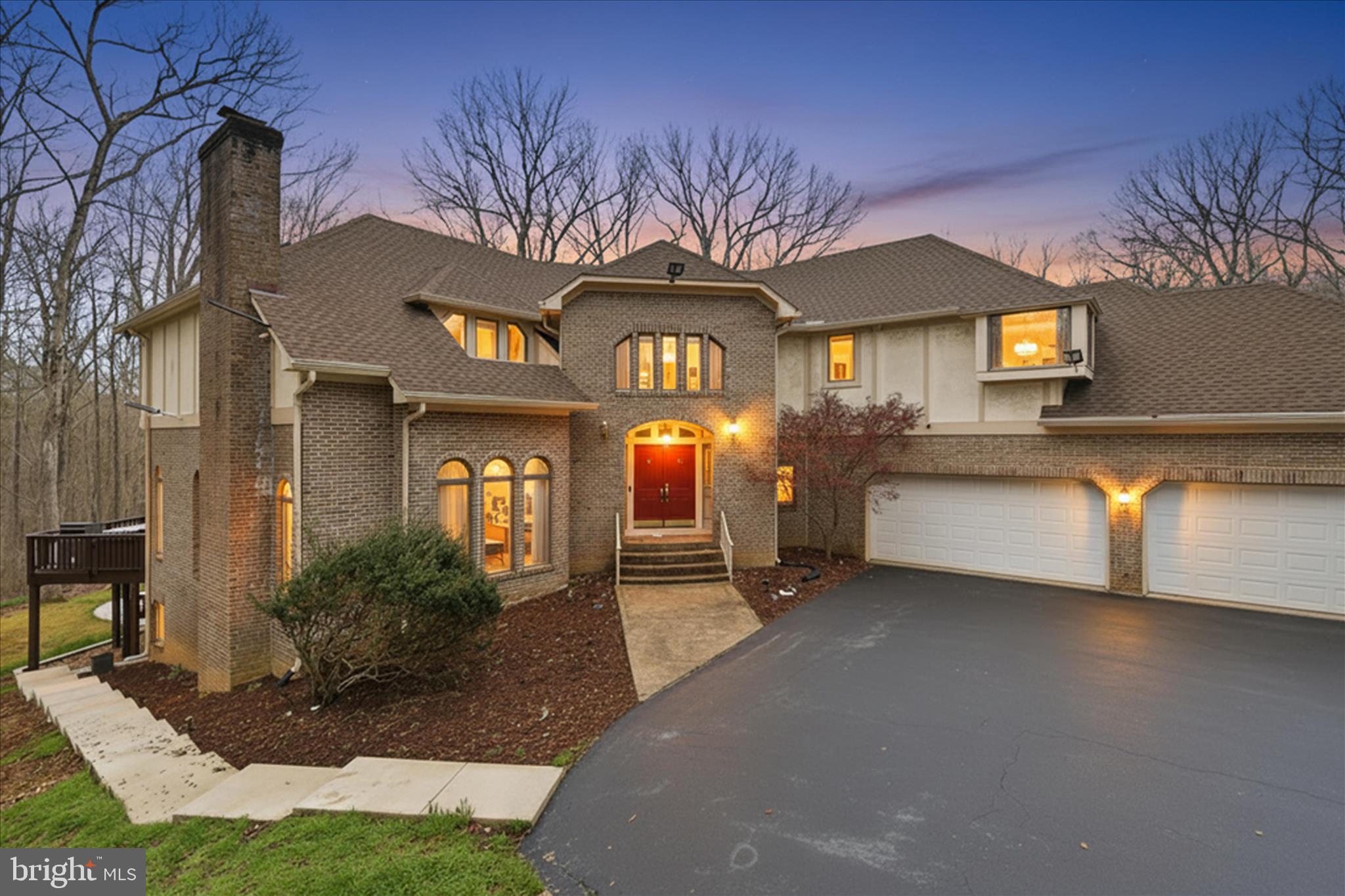If you're looking for elegance and sophistication.. this Clifton home is it. 
It has 5 large bedrooms, 3.5 baths and is sited on a serene private 6 acre lot with a long driveway. Stunning views greet you out of every window. Step into the double door entryway to find a circular staircase leading you to the upper level and soaring ceilings throughout. On the main level.. you're greeted by walls of windows that fill the home with lots of natural light. The expansive family room has a 2-story large brick fireplace with high ceilings and a wet bar. The kitchen comes with the finest appointments including a double oven, in-island sink, quartz countertops,, stainless steel appliances and more. The formal living and dining room are simply elegant. A main level office, a powder room that has just been updated (April 2026) with a long stone sink and designer mirror and lighting come too. The grand primary suite is a true sanctuary, featuring a spacious walk-in closet and a luxurious, spa-like bath with Washlet toilet. There are 3 more spacious bedrooms on the upper level with another full bath. The walk-out lower level provides exceptional additional living space, complete with a very large recreation /movie/game room, fitness area, full bath, and an extra guest room—ideal for hosting family and friends. The 3 car garage is expansive.. it has room for loads of storage and epoxy flooring. The rear deck wraps around a large portion of the home. Great for entertaining. There's also a lower level patio. The lot is picture perfect with its mature trees and landscaping. It's truly tranquil and private. All of this is ideally located just moments from the historic town of Clifton, known for its charming shops and delightful dining options. A rare opportunity to own such a remarkable home. Close to all the major commuter routes, shopping and so much more. Don't miss this one.