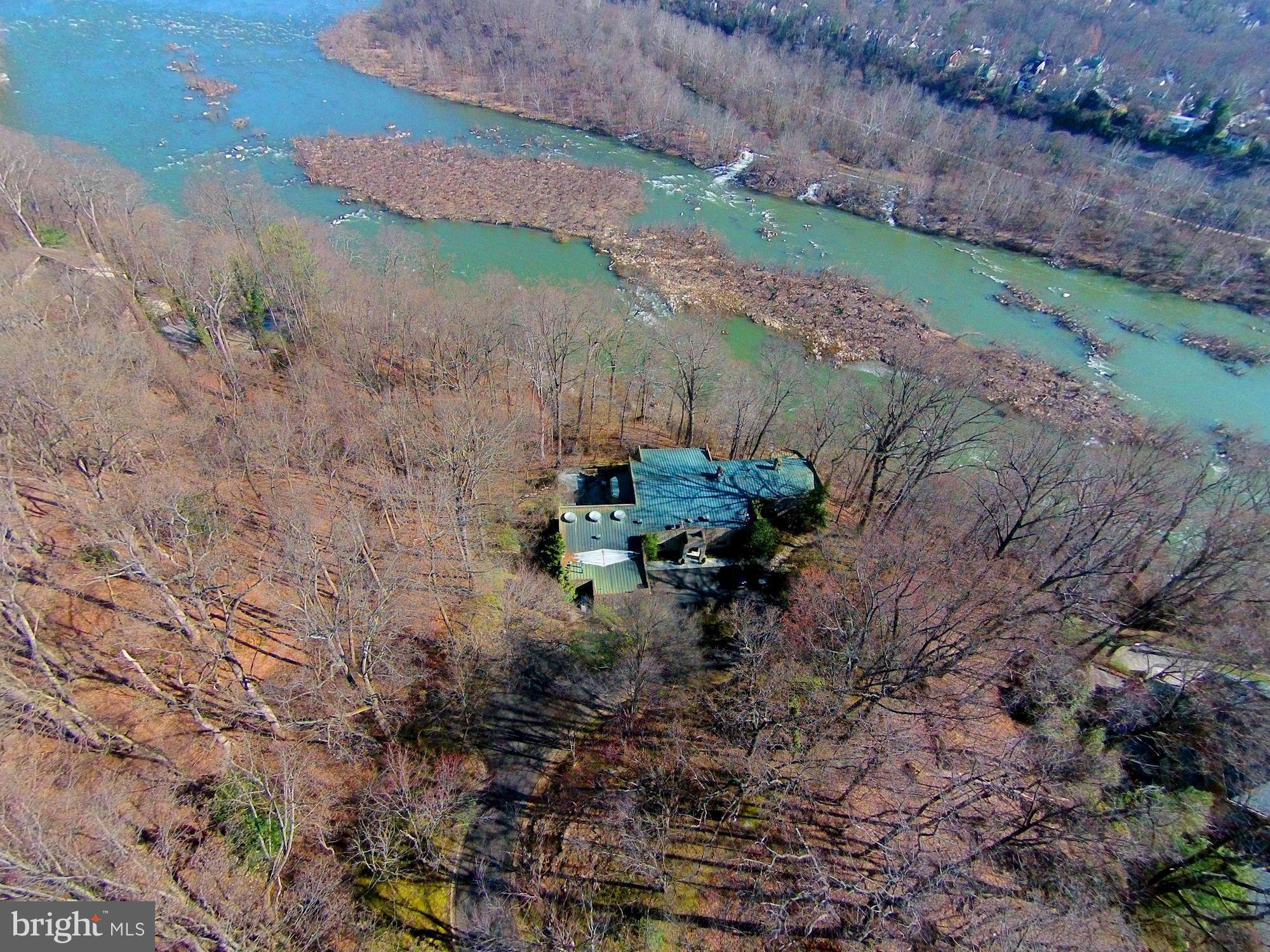 BEST VIEWS ON THE GOLD COAST!  5.4 ACRES w/ 375+FEET of Potomac RIVER FRONTAGE with stunning vistas up and down the river. Beautiful Mediterranean style Villa currently set on property with grand entertaining spaces outfitted with natural plaster interior, Pelion stone floors from Greece, and jaw dropping vantage points of the Potomac for all seasons throughout.