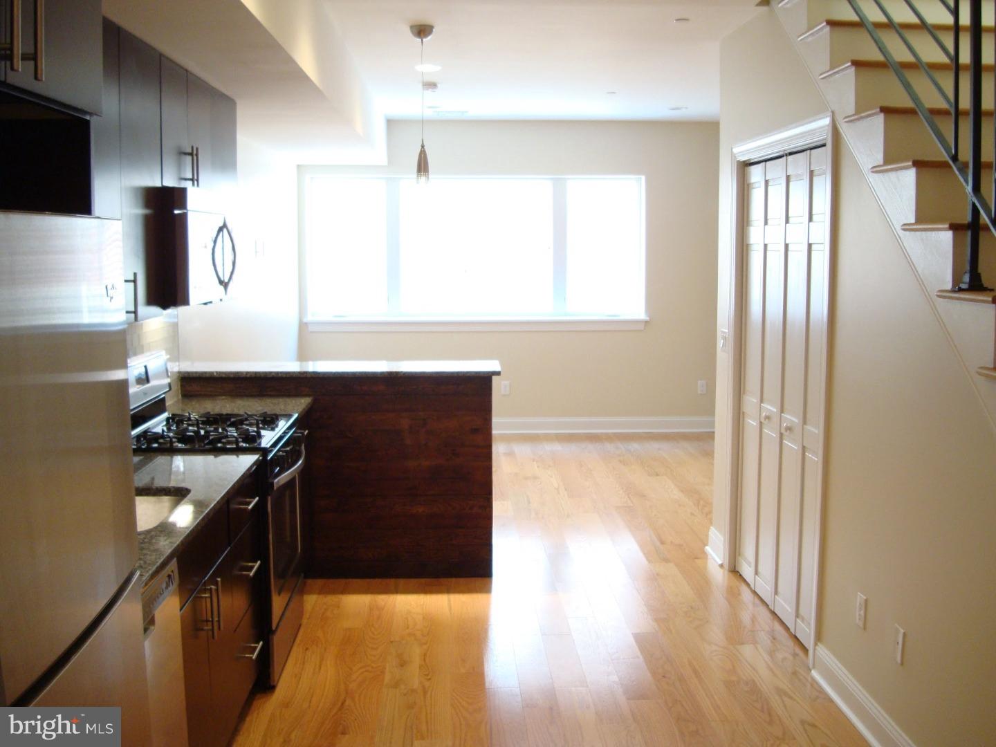 Welcome to this beautiful 1 bedroom 1.5 bath, bi-level apartment in the heart of Northern Liberties that has a roof deck and a flex space perfect for an office! This property features exposed brick, reclaimed wood, hardwood floors throughout, and stainless steel appliances. The first floor has an eat in kitchen, living room, 1/2 bath, and a huge coat closet. The second floor includes the bedroom with closet, washer and dryer, an open flex space, and stairs leading up to your private roof deck! This property is located within steps of Northern Liberties neighborhood spots, restaurants, parks, cafe's and more! $100 off First Month's Rent. Schedule your showing today!