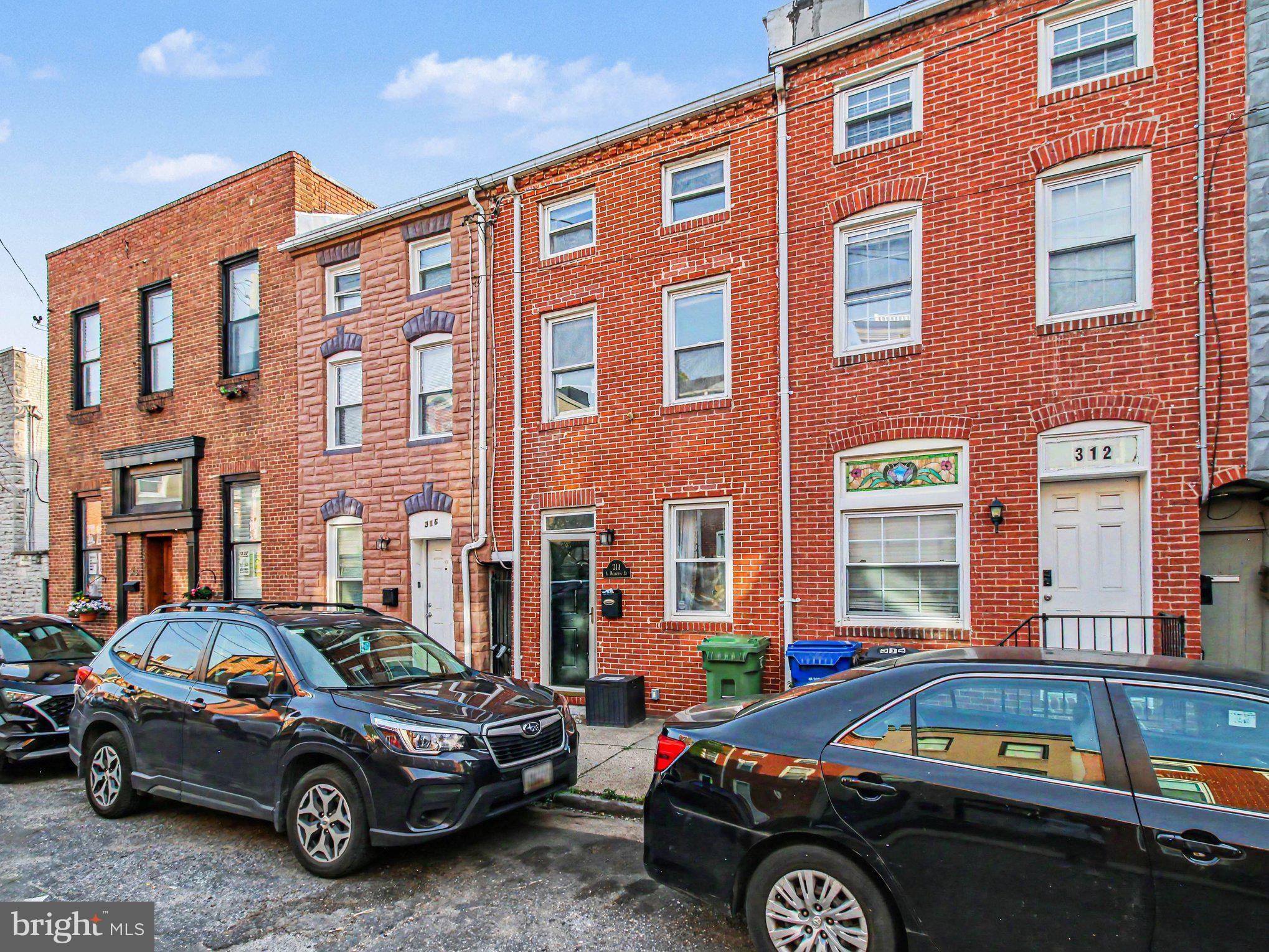 Welcome to 314 S. Regester Street — A Distinctive Retreat in Historic Upper Fells Point

Tucked away on a quiet, friendly one-way street in the heart of historic Upper Fells Point, 314 S. Regester Street offers the perfect balance of vibrant city living and private retreat. Just steps from Broadway Square, the Fells Point Farmer's Market, Thames Street nightlife, local shops, renowned restaurants, and the waterfront promenade, you'll enjoy one of Baltimore's most walkable and sought-after neighborhoods.

Behind its classic Baltimore façade, this thoughtfully designed rowhome combines historic charm with modern comforts. Hardwood floors, charming architectural details, granite countertops, and stainless-steel appliances create a warm and inviting atmosphere throughout. The updated kitchen and bathrooms offer contemporary style, while unique features make this home truly stand out.

The main level includes a convenient powder room, and a dedicated laundry room. Upstairs, a generously sized bedroom provide flexibility for guests, family, or work-from-home living. The expansive third-floor primary bedroom offers a private retreat with plenty of space to relax and recharge.

What truly sets this home apart are its wellness-inspired amenities. Unwind in your private sauna, enjoy morning coffee in the peaceful Zen garden, or relax outdoors after a day exploring the neighborhood. These rare features create a sense of tranquility that's hard to find in the heart of the city.

Whether you're searching for your first home, a charming Baltimore pied-à-terre, a low-maintenance urban lifestyle, or an investment in one of Baltimore's most desirable neighborhoods, 314 S. Regester Street offers exceptional flexibility and appeal.