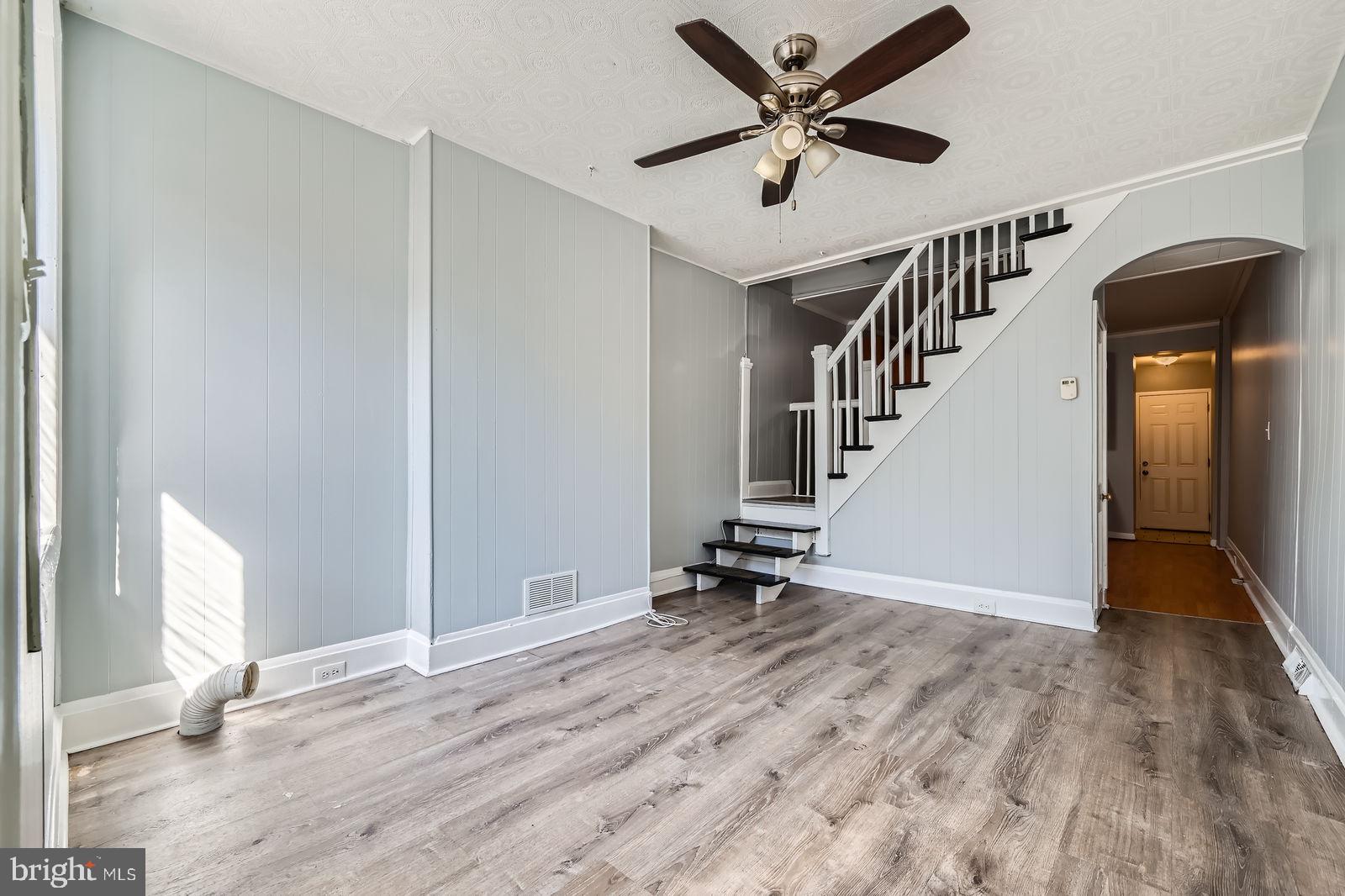 Located in the heart of Highlandtown!   
 Charming Home with just the right amount of efficient space-  Open floor plan on the main level. Easy maintenance laminate flooring. Spacious eat in kitchen with natural wood cabinets. Central air and ceiling fan help with your utility bills. Neutral decor. Fenced rear patio/yard. Basement has storage/laundry area as well as usable space for rooms or more living area.. two bedrooms and a full bath on the upper level and a full bath on the main level - -Freshly painted -- Central location to walk to "The Avenue" for shopping.. Patterson Park is nearby and minutes to Canton, Downtown Baltimore and Hopkins. Nice starter home in one of Baltimore's favorite communities!