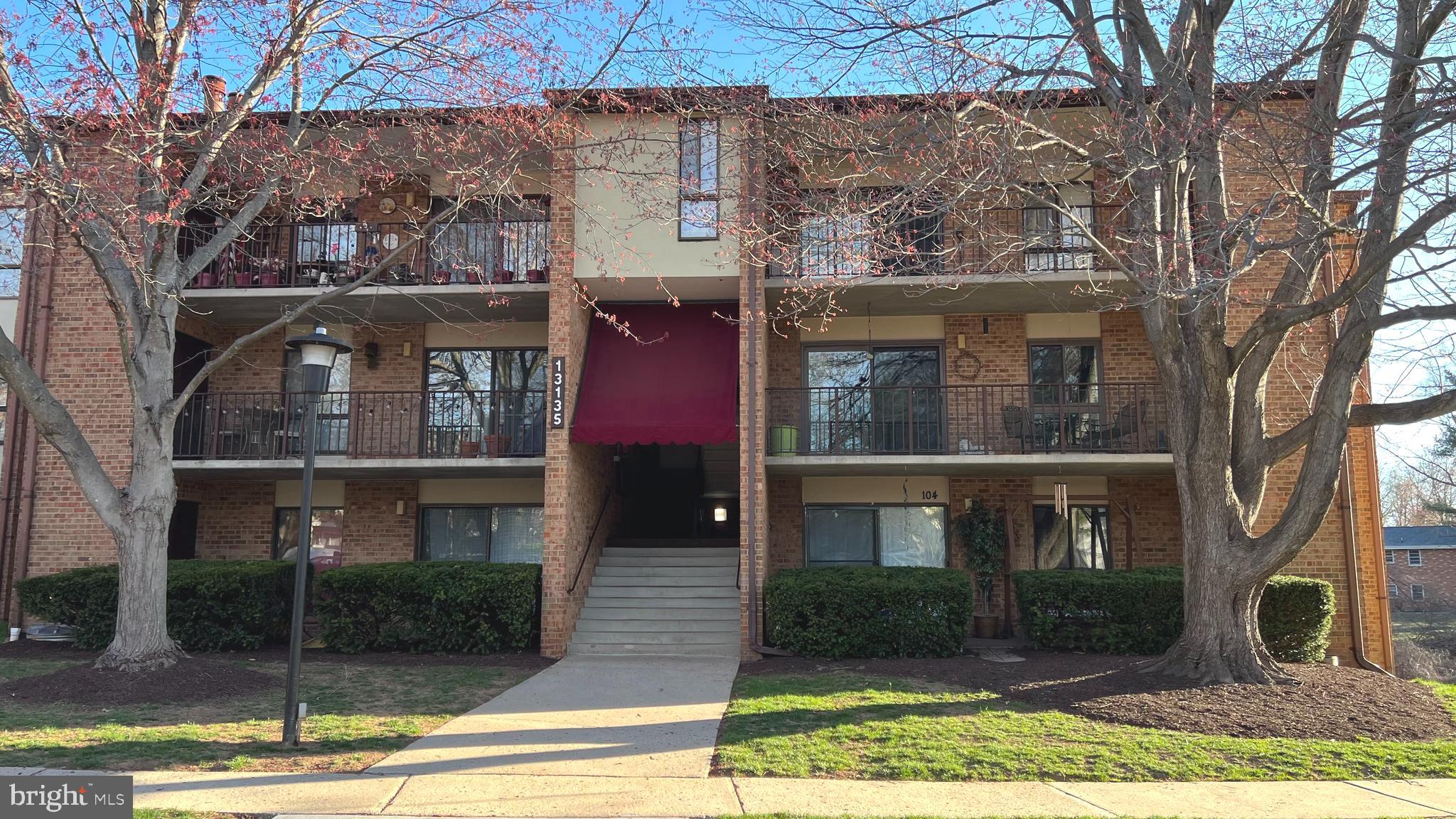 Welcome to this beautiful and ready to move in condo with 1 bed, 1 bath and a den.  This beautiful condo is in a private section that only has 4 units.  It is painted, with new carpet, updated floor, fridge, stove, microwave, and dishwasher (stainless steel appliances) and Granite countertop.  The condo has a reserve parking spot with plenty of street parking.  Upon entering the unit, you will be captivated by the open-concept living room and dining room combination with updated floor.  The living room walks out to the deck area that is bathed in natural light and the beautiful view of the peaceful trees.  The deck is large enough for chair and table.  The kitchen boasts stainless steel appliances, with plenty of kitchen cabinets and ample counter space with new Granite countertop, for making meal preparation and a have a great conversation.  There is a space is the kitchen for table and chairs.  The den is also located off the kitchen that could be used for office space.  The sun soaked; open floor plan offers plenty of living space. The primary suite features a walk-in closet, a closet, and a full private sink. There are a regular size washer/dryer in the unit for your convenient.  The HVAC unit is about 3 years old. The great community has a swimming pool.   It is located near shopping centers, Starbucks, Giant and so much more. Montgomery College Germantown Campus is just minutes away also.  It offers the perfect blend of location, functionality, and sophistication. Welcome Home!