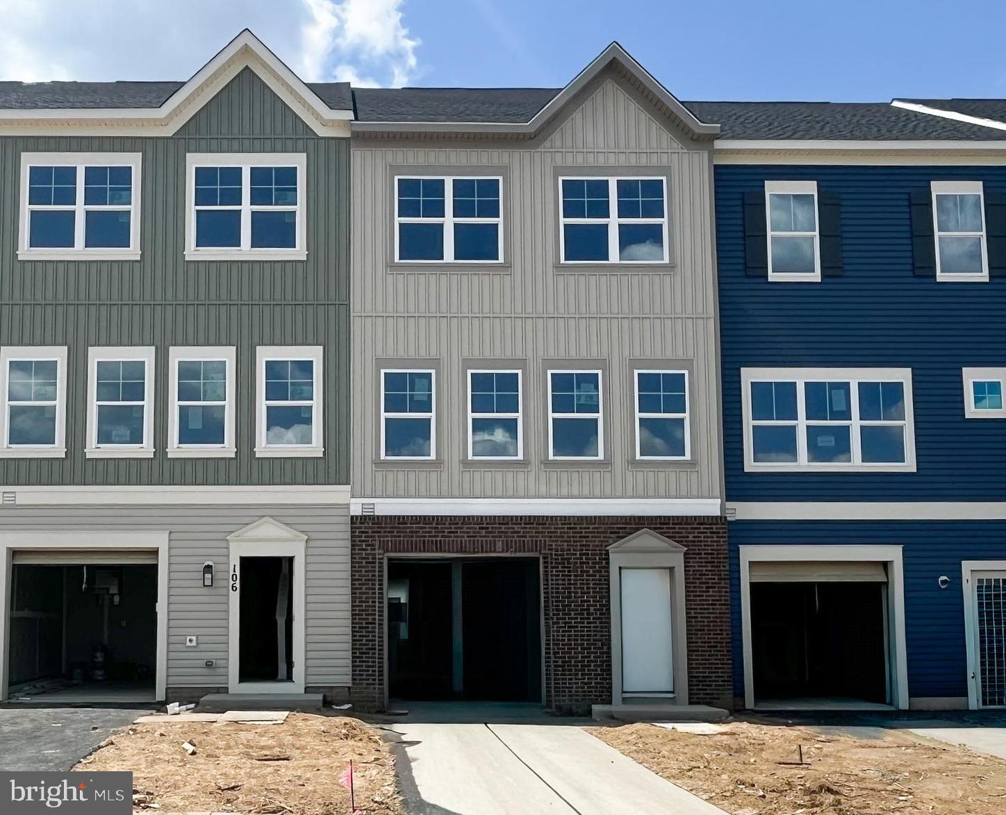 Brand‑new construction meets modern comfort in this stunning 4‑bedroom townhome, set for a summer move‑in! With special financing opportunities and closing cost assistance available, there’s never been a better time to make this beautiful home yours.
Perfectly positioned in the newest section of Snowden Bridge, the home backs to open space—offering added privacy and peaceful views—while being just steps from the community’s newest amenities. A striking ⅓ brick front delivers timeless curb appeal, and pulling directly into your garage adds everyday ease. The entry‑level bedroom with nearby full bath is ideal for guests, multigenerational living, or enhanced accessibility.
Upstairs, natural light pours through the thoughtfully designed main living area. The kitchen flows seamlessly into the family room, creating an inviting space for entertaining or relaxing at home. Highlights include stainless steel appliances, stylish colada cabinetry, and Alpine Valley countertops. Step out onto the deck just off the kitchen—your perfect outdoor retreat for morning coffee or evening unwinding, with no neighbors behind.
The upper level is anchored by a spacious primary suite featuring a large walk‑in closet and private ensuite bath. Two additional bedrooms, a full bath, and a conveniently located laundry area complete this level for everyday practicality. 
Living in Snowden Bridge means enjoying resort‑style amenities right outside your door, including a swimming pool, pirate‑themed water park, indoor sportsplex, community park, playgrounds, fenced dog park, bike track, scenic walking trails, and a picnic pavilion. You may never want to leave—but when you do, you’re just minutes from shopping, dining, and entertainment in Winchester.
New, beautifully finished, and lifestyle‑rich—this home truly has it all. Schedule your visit today and take advantage of limited‑time incentives before it’s gone.
Note - interior photos are similar while home is under construction,
