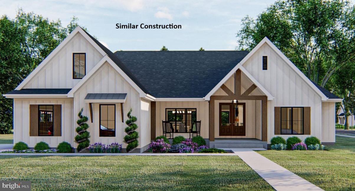Late summer delivery!
This beautifully designed 4-bedroom, 3.5-bath home offers the perfect blend of elegance, comfort, and functionality in a peaceful, wooded setting. The exterior highlights a stylish mix of stone and siding, creating a timeless and elegant curb appeal. Highlighted interior features include a split-bedroom layout with a spacious primary suite. The open-concept living area highlights a fireplace and a formal dining room The kitchen will feature a large island, Quartz countertops throughout, and a stainless steel kitchen appliance package. 
Upstairs, the over 400 square foot loft can be finished for additional bedroom and bathroom for $65K extra giving you an office plus 4 bedrooms and 4.5 baths. The unfinished basement with combo safe room offers plenty of potential with a walkout access.  Enjoy outdoor living on the beautiful lot, surrounded by mature trees for privacy and serenity.
Hospital less than 5 minutes away and just minutes to Cacapon Resort State Park where residents can enjoy access to golf, dining, walking trails or visit downtown Berkeley Springs and more. Don’t miss your chance to make this incredible new home yours! Note that this home will have a front load garage.

Under Construction close to hospital & amenities.

"Please note: The photos shown are of a similar completed home. The specific home may vary in floor plan, finishes, or upgrades. The builder reserves the right to substitute materials that may not be available to avoid delays."