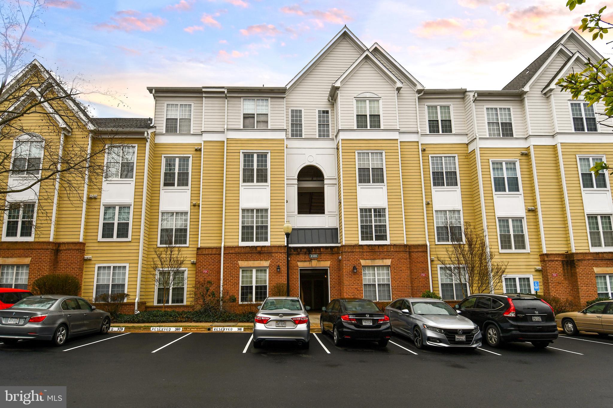 Welcome to this phenomenal 2 bedroom 2 full bathroom unit in the highly coveted Worldgate Condo project, located conveniently to the Herndon Metro (walking distance) Dulles Airport, and a plethora of shops, restaurants, and local hotspots. This unit boasts many updates and upgrades, and it is the largest 2 bed 2 bath floorplan, totaling 1,140 square feet. Both bathrooms were completely renovated and remodeled in 2024, with a phenomenally remodeled in suite primary bathroom. Flooring was renovated in 2023. All new sinks and plumbing. A brand new hot water heater installed in 2025. All kitchen appliances have been replaced within the last 5 years, including a new refrigerator and built in microwave in 2024. Off the large dining room and living room is a spacious private patio/porch which lets in great natural light throughout the living area, conveniently on the opposite side of the unit as both bedrooms. A nice separation of living and entertaining space from bedrooms. The unit has in unit washer and dryer, as well as a gas fireplace. Your dedicated parking space is #385, conveniently located right in front of the building. The Worldgate Condo Community has pools, a clubhouse, recreation center, and a plethora of amenities. You don't want to miss this unit. Virtual tour uploaded.