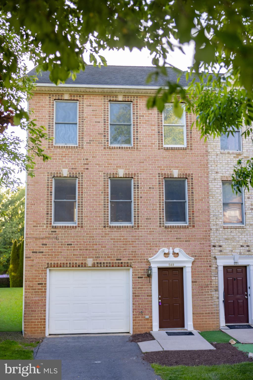 Welcome home to this beautifully renovated, all-brick, three-story townhome that perfectly blends style, space, and convenience. Recently renovated including luxury vinyl plank flooring, fresh paint throughout, and new appliances make this home feel as good as new. With more than 2,100 square feet of living space, this exceptional property delivers the modern features you are looking for. 
The ground level offers a versatile recreation room with walkout access to the patio and backyard, perfect for a home office, gym, playroom, or additional living space. Upstairs, the bright and spacious living room creates an inviting setting for relaxing or entertaining, while the dining room is ideal for everything from casual meals to holiday gatherings. A convenient half bath is also located on this level. The expansive, sun-filled kitchen is a standout feature, complete with all new cabinets, a beautiful and durable quartz countertop, brand new stainless steel appliances, including an oven with cooktop, dishwasher, and LG refrigerator with ice and water dispenser. Step directly from the kitchen onto the deck and enjoy seamless indoor-outdoor living, ideal for dining and entertaining.
The third floor features a spacious private primary suite with its own full en suite bath, offering a comfortable retreat at the end of the day. Two additional generously sized bedrooms provide flexibility for family, guests, or workspace, and a second full bathroom adds convenience. A dedicated laundry room with LG front-loading washer and dryer completes the upper level.
Adding to its appeal, Pangborn Park is just minutes away and offers picnic areas, walking and biking trails, tennis and volleyball courts, and a scenic pond giving you easy access to recreation and outdoor enjoyment close to home.
With its impressive updates, generous space, and unbeatable combination of comfort and convenience, this townhome is a rare opportunity in a sought-after community. Schedule your showing today and discover all the possibilities this exceptional home has to offer.
