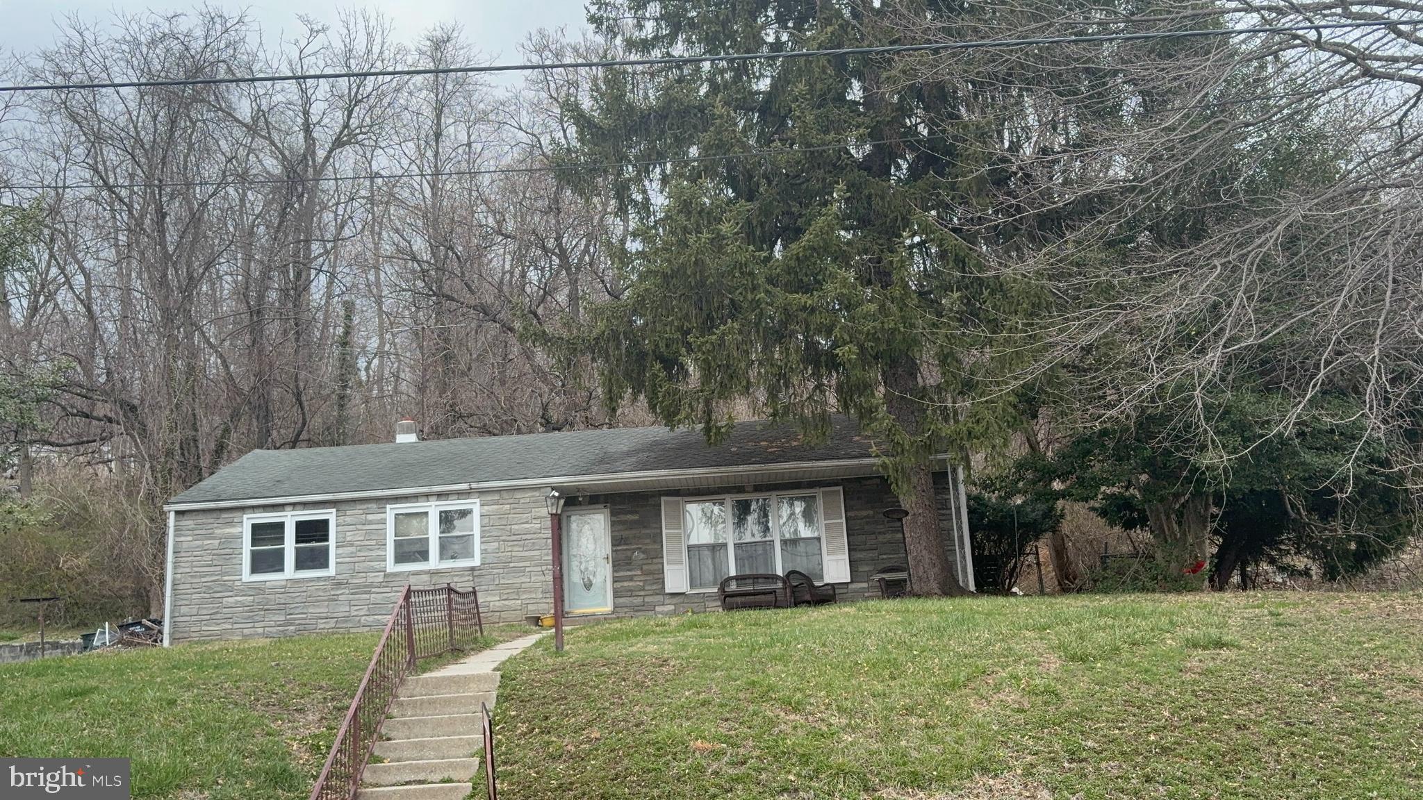 Offer Deadline is April 8  at 10pm . Seller will make a decision on April 10th
Buyer is responsible for verifying the accuracy of any and all information provided in the MLS. Buyer is responsible for any and all inspections, certifications, repairs, and requirements for resale, including but not limited to the certificate of occupancy and lender-required repairs.
Fixer Upper that is perfect for someone looking for some sweat equity and Investors Dream. Home is perched comfortably at the top of a hill. Walk in the front door into the main living room that opens into the dining room and Living room &  main hallway to the bedrooms. Four bedrooms, 3 on the left  off the main hallway and 1 Bedroom on the left, Off the dining room.  Dining room is off the galley style kitchen. front and back yard with fencing on the side of the house. Great property with tons of potential. This home offers street parking. Schedule a showing today.