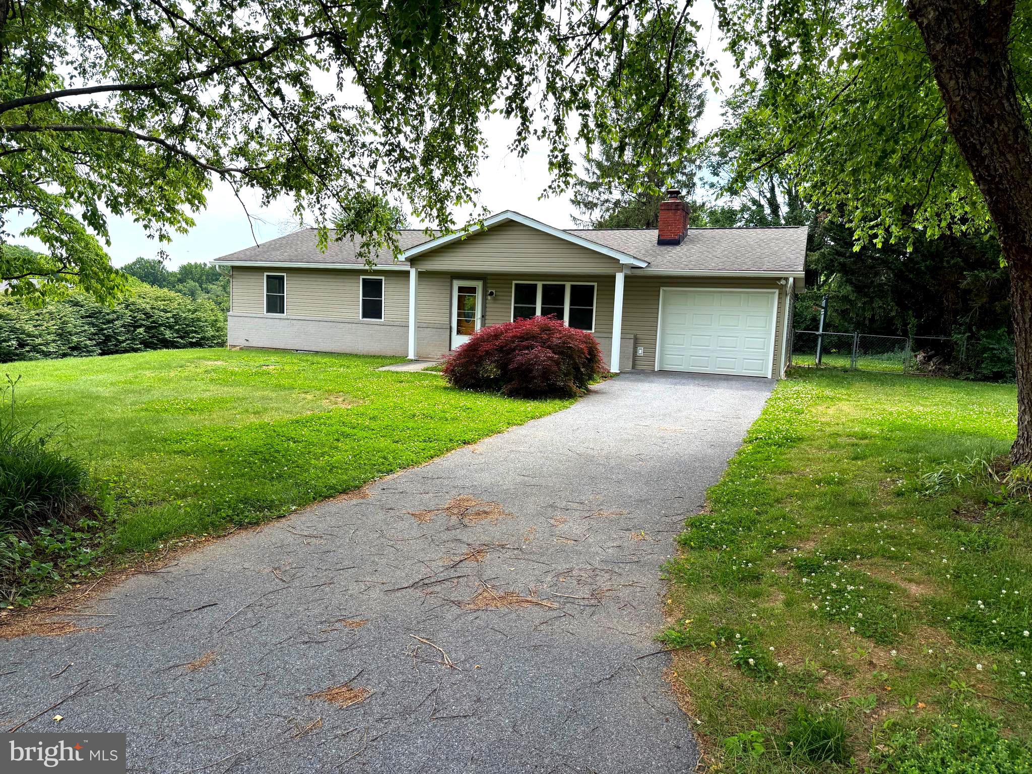Open house Sunday June 7 from 12 to 2 pm. Floor plans just added. Check out new photos just uploaded! Beautiful updated rancher in desirable Walnut Ridge, freshly painted thru out and is in move in condition. Featuring 3 bedrooms 1 full bath, one half bath all on the main level, 1 car garage, plus fenced yard. Remodeled in 2016- roof, siding, gutters, exterior doors, windows, refinished hardwood floors, appliances, kitchen counters, commodes, recreation room carpeting, HVAC, composite deck, fenced rear yard, driveway, garage door & opener. Upon entering you will be greeted with a spacious living room that includes crown molding, a ceiling fan and wood burning fireplace & large coat closet. Beautiful hardwood floors in living room, dining room, hallway & all bedrooms. Dining room off kitchen includes crown molding, ceiling fan with patio door to composite deck and fenced rear yard with 2 sheds. Primary bedroom with ceiling fan, closet and ensuite half bath. Plus two other large bedrooms with ceiling fans & one has crown molding. There is a large full bath in the hallway with closet, tub/shower, updated vanity and newer commode. The hallway also has a linen closet and another clothes closet. The lower level is mostly finished with a very large recreation room, game room area and large laundry/mechanical room with built-in work bench. THE HOME SHOWS VERY WELL AND IS BEING SOLD IN "AS IS CONDITION." BUYERS ARE WELCOME TO DO INSPECTIONS ONLY AFTER A RATIFIED CONTRACT STATING SPECIFIC INSPECTIONS DESIRED.  SELLER WILL NOT BE MAKING ANY REPAIRS. The home is very convenient to shopping, restaurants and major road such as Rt 140 & 97.