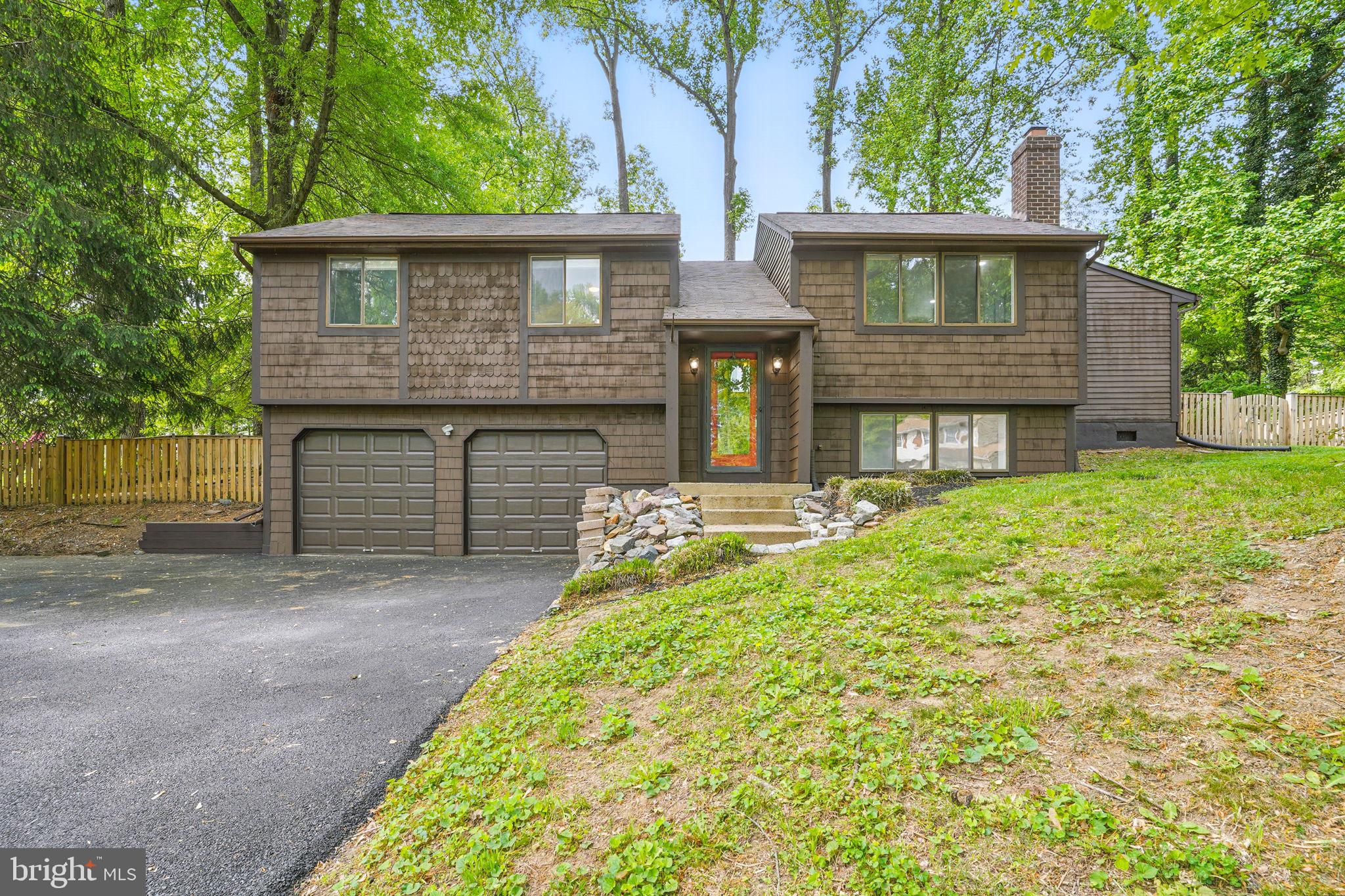 Welcome to this recently renovated 5 bedroom, 2 bath, 2-car garage single family home on a cul de sac lot. LVP and hardwood floors throughout the entire home. The main level features 4 spacious bedrooms and 1 fully renovated bath with dual vanities, a family-size, eat-in kitchen with separate breakfast area, granite counters and 1 year old stainless steel appliances. Spacious living room with recently installed recessed lighting on a dimmer. Huge sun room with skylight is perfect as a second living area, an office, or even a 5th bedroom as it has its own walk-in closet. Walk out the sliding door from the kitchen to the gorgeous and screened-in porch with built-in bench seating and the huge, fully fenced backyard. The fully finished lower level features a large bedroom with sitting area and a cozy wood-burning fireplace, as well as a brand new full bath with custom tile. There's also a large utility room with brand new water heater and new full size washer and dryer. There's even a 50 Amp EV charging outlet in the garage. All this in a great location just off route 1, within minutes to tons of shopping including the upscale shops at Stonebridge, Wegmans, Potomac Mills Outlets, Costco, movie theaters, 1 mile to Leesylvania State Park & the Potomac River (boating, kayaking, hiking), Quantico Marine Base, and Ft. Belvoir.