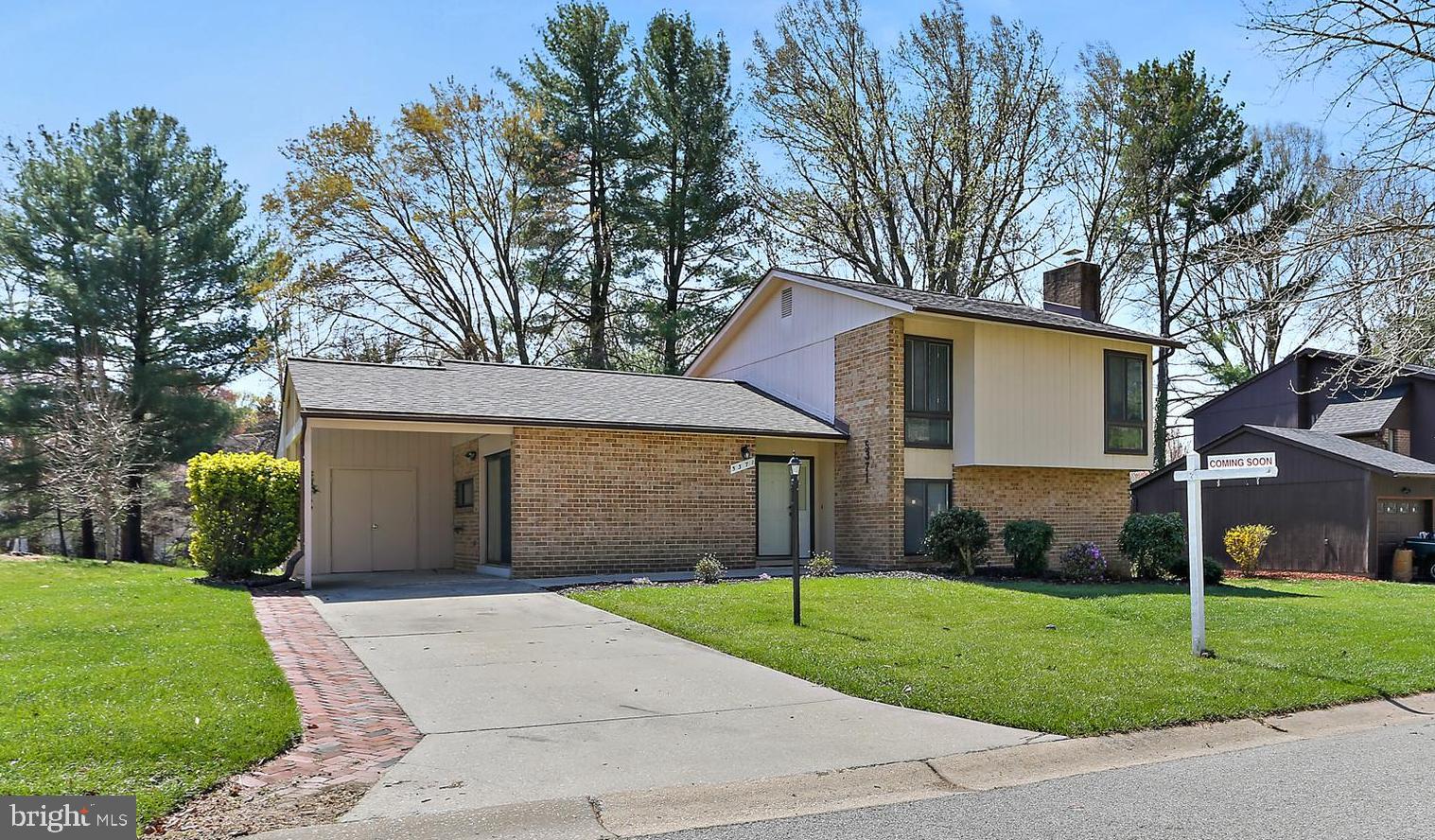 OFFER DEADLINE: Sunday, April 6th at 10pm
Nestled in an established, tree-lined neighborhood, this beautifully updated split-level home offers the perfect blend of comfort, nature, and convenience. Located within walking distance to the community pool and backing to trees. The access to the hiking trails/paths is across the street, and they lead to a pond and all the connecting Columbia lakes and parks. This home is a haven for those who love the outdoors.

Step inside to an open floor plan filled with natural light. The kitchen features 42” cabinets, granite countertops & a new stove. The living room and rear additionsboth open to an expansive 18x20 entertainment-sized deck—ideal for gatherings or peaceful mornings.

Upstairs, you'll find real hardwood floors in all three bedrooms, while the lower level boasts a cozy family room with a wood-burning fireplace, a fourth bedroom, an updated full bath, and a laundry room. The main level den/fifth bedroom/home office is an addition with cathedral ceilings.

Major updates include: 2025 roof replacement & whole house freshly painted, 2024 washer & stove, All windows, sliders, and front door replaced approx 2015

Tucked away yet centrally located within the award-winning Howard County School system, this home offers timeless charm, thoughtful updates, and easy access to both nature and everyday essentials.