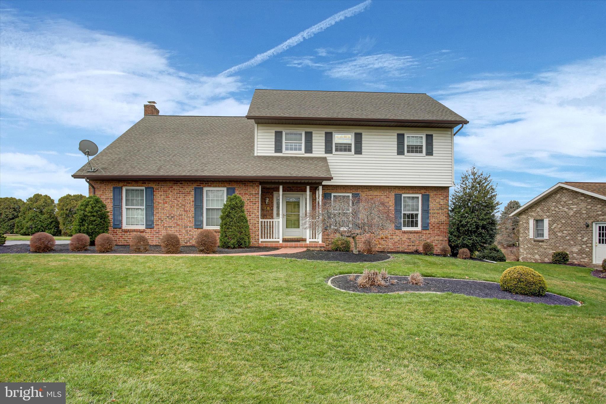 Immaculate and move-in ready, this meticulously cared-for 4-bedroom, 2.5-bath home in Laurich Gems South offers 2,800 square feet of beautifully maintained living space inside and out. Exceptional curb appeal. Hardwood floors. Open, spacious, layout. The family room features a propane fireplace. The well-appointed kitchen comes complete with all appliances. The primary suite has 3 closets including an immense walk-in closet. Additional bedrooms are generously sized. Lovely sunroom with charming brick flooring, overlooking the beautifully kept exterior. 2-car garage.