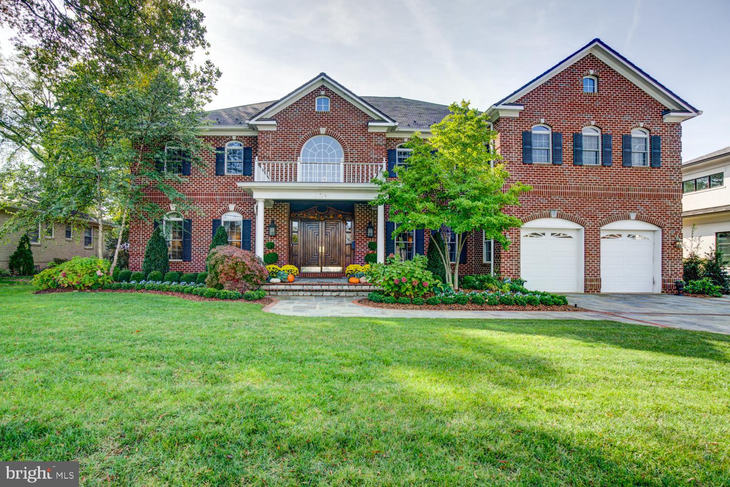 Welcome to 2205 Windsor Road!  Located in highly sought-after Belle Haven, this beautifully appointed eight en-Suites plus 2 half bath, grand center-hall colonial offers the ultimate in luxury living.   Among the many special features of this spectacular 10,200 sq ft home are a grand entrance hall with 22 foot ceiling and an exquisite circular staircase, Brazilian cherry floors, elegant moldings, open chef's kitchen, and full wet bar.  Elegant dining, formal and casual living rooms and main-level en-Suite that can be used as a library, conservatory or bedroom suite complete the main level.  The smart design of the home provides open spaces and private places for living, learning, working and enjoying life together and privately.   Above the grand staircase, a stunning owners' suite with exquisite spa bathroom and spacious dressing room await.  French doors lead to a private balcony that overlooks a beautifully landscaped garden below.  Large closets, outfitted with built-in cabinetry and closet appointments, are designed to accommodate all seasons of apparel and gear.  Four additional en-suites on this level provide options for dedicated offices, bedrooms and guest accommodations.   A back stairway leads to the Kitchen, bar, laundry center and garage.   The third floor offers a private guest apartment with separate living room, bedroom, office area and full bath.  The fully finished lower level provides multiple living, entertaining and gaming spaces for a variety of activities and interests.  The Family, Recreation and Game rooms room are elevated by stunning natural blue stone flooring.  The media room is wired for surround sound viewing on stadium seating.  A large en-suite can be used as a dedicated home gym or an additional work or living space.  A kitchenette, bar, and additional half bath come in handy when entertaining.  Spacious storage rooms provide ample space for housing SmartHome Technology equipment, off-season gear, and catering tools.     Perfect for staycations and home quarantines,  a expansive backyard hardscape provides the perfect place for enjoying the best of the outdoors.  The meticulously-designed setting includes a large granite bar that seats 12, a built-in chef's kitchen with new charcoal grill, gas burners, warming drawers, beverage fridge,  keg fridge, beer tap and s/s ice bin. Expansive dining and lounging areas provide even more ways to utilize the outdoor oasis.  Beautiful wood arbors with retractable, waterproof awnings frame enable guests to use and enjoy the incredible outdoor living space in any kind of weather. Large screen video screens, heat lamps and stone hearth allow you to watch your favorite events all year long.     Constructed in 2006 by All American Homes, this home has one foot thick walls anchored by two layers of rebar in the foundation, Anderson windows throughout, slate roof plus oversized two car garage.  The property has been meticulously maintained and updated with custom finishes and special features throughout.    Top-of-the-line appliances include Sub Zero Full Freezer, Sub Zero full Refrigerator, Wolfe Range with double oven. Scotsman ice maker, wine refrigerator, two Bosch Dishwashers, outdoor beer tap and keg refrigerator, built in charcoal grille, beverage refrigerator and food warming drawers.   This magnificent Smart home offers all of the conveniences, features, fine details and amenities that today's luxury buyer is seeking.  2205 Windsor is a wonderful place to call home!