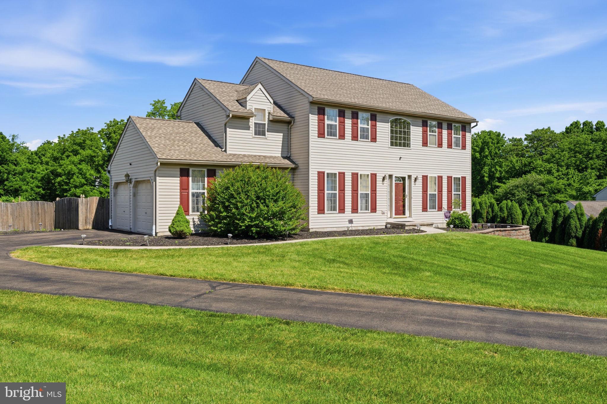 An exceptional offering in the sought-after Elkdale Community.  Set on a flat, fenced acre in a quiet, non-deeded restricted enclave, this distinguished two-story colonial offers the rare combination of privacy, space, and convenience, just minutes from Route 1, Route 896, everyday shopping, including Walmart, and the welcoming town of Oxford and Lincoln University.  A long asphalt driveway leads to a two-car side entry garage and welcomes you home.  Step through the hardwood foyer into a thoughtfully designed traditional floor plan featuring a formal living room, elegant dining room, and an expansive eat-in kitchen anchored by a center island with bar seating and a large eat-in kitchen area,  ideal for entertaining or casual family living. The kitchen flows effortlessly into the family room, where a stone accent fireplace creates a warm gathering place for quiet evenings or game day. Upstairs, four generously proportioned bedrooms await, each offering ample closet space and ceiling fans. The primary suite is complete with a private sitting area, walk-in closet, and ensuite bath featuring dual vanities, a soaking tub, and a separate shower.  The professionally finished lower level extends the home's living space beautifully, offering a Berber carpeted recreation area perfect for a pool table or media lounge, a dedicated exercise room, a separate laundry area with utility sink, and a walkout to the rear yard, along with additional unfinished storage.  Outdoors, the flat, fully fenced lot provides space for gardening, recreation, or simply unwinding beside the included storage shed and patio. Recent updates offer added peace of mind, including a roof installed in approximately 2024, a water heater in 2017, and an HVAC system in 2018. Located within the desirable Oxford Area School District. A rare opportunity awaits. Schedule your private showing today.