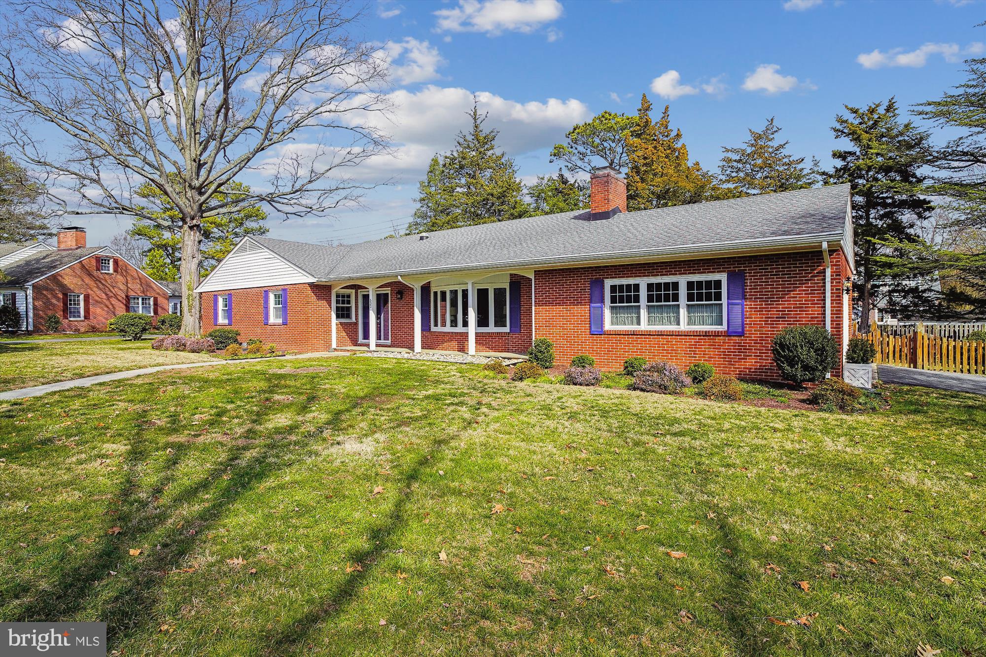 Beautifully updated and fully furnished, this brick ranch sits on nearly half an acre with a fenced backyard on a picturesque, tree‑lined street. Its location is exceptional—just a short walk to the YMCA, Idlewild Park, Rails‑to‑Trails, schools, restaurants, shopping, and the Art Academy.

This light‑filled, meticulously maintained 3‑bedroom, 2.5‑bath home offers effortless single‑story living and an impressive list of features: two‑zone A/C with hot‑water baseboard heat, an asphalt driveway, a two‑car attached garage, a massive attic for storage, a spray‑foamed crawlspace, a fireplace, and an expansive sunroom overlooking the fenced yard. The kitchen includes quartz countertops and an adjoining office or sitting room. The primary suite features a walk‑in closet, and hardwood floors run throughout the home. Additional highlights include professional year‑round landscaping, gutter guards, an extra‑wide hallway, and a welcoming foyer.

Set in one of the area’s most sought‑after neighborhoods, this home offers the best of in‑town living within a peaceful, idyllic community close to downtown.