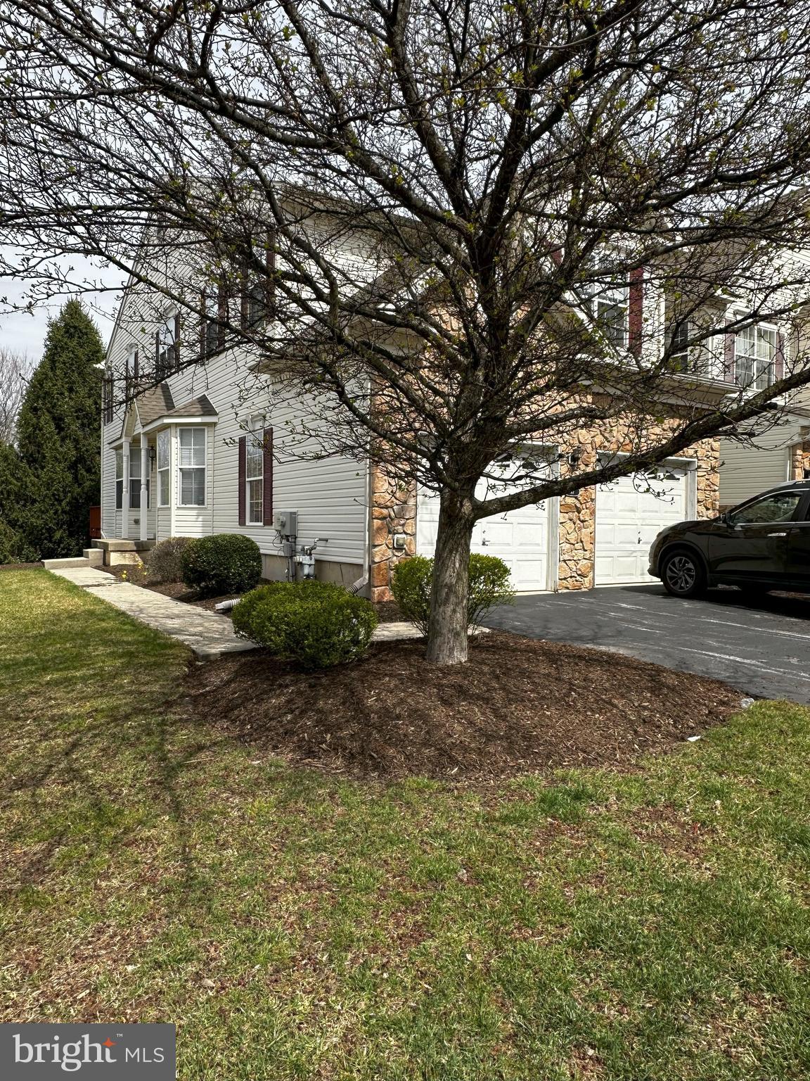 Second floor carpet will be replaced before tenant move in.  House will be professionally cleaned before tenant move in. Welcome to 147 Fringetree Drive - two car garage End Unit in Whiteland Woods community. This well-maintained residence offers 3 bedrooms, 2 full bathrooms, and 1 half bathroom, encompassing approximately 2,492 square feet.  With the side entrance walk into the  foyer which leads to formal living and dining rooms, Spacious family room with cathedral ceilings and a gas fireplace, Eat-in kitchen equipped with an island and pantry. This entire first floor has upgraded wood floors of elegance. From the kitchen you can access the deck ideal for outdoor retreat. Well appointed powder room and access to a two-car garage completes the first floor. Second floor has two generously sized bedrooms, a hall bathroom, laundry and the Primary Bedroom featuring a walk-in closet, sitting area, and a Primary bath with a whirlpool tub, stall shower, and dual vanity. Whiteland Woods is a well-established neighborhood with well-maintained landscapes. Residents have access to a variety of amenities, including: Swimming pool, Tennis courts, Children's outdoor play areas, Hiking trails etc.. Situated in West Whiteland Township, this house provides convenient access to major highways such as Routes 30, 100, 202, and the PA Turnpike. The SEPTA regional rail is also nearby. Shopping center like Main Street at Exton offering a variety of retail and dining options.  Overall, 147 Fringetree Drive combines spacious living with a host of community amenities and a prime location, making it a desirable place to call home.