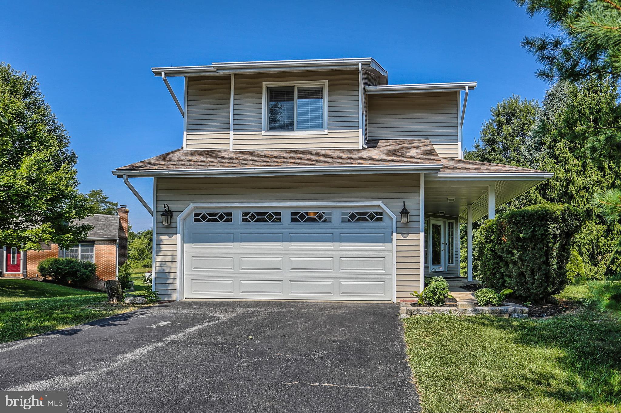 Welcome to this like new contemporary home in peaceful and serene Blue Meadows Farm. This is a MUST SEE move in ready home. The home is further secluded in a sparsely travelled cul-de-sac. The roof was just replaced with a high performance architectural shingle roof.  The first floor boasts an open floor plan for ease of living and entertainment. The kitchen is practically new with  very recently updated granite countertops , and new SS appliances. The kitchen and breakfast bar opens to a living and dining open area flooded with natural light with floor to ceiling windows. A beautiful marble FP complements the stunning natural oak hardwood floors. Unwind in your living room at the end of your day and enjoy the architectural beauty of cathedral vaulted ceilings. You may choose to step out of your living room to your wood deck and enjoy the sights and sound of nature overlooking protected(no developments) wooded arears. The second floor has 3BR and 2 full bathrooms. The private MBR suite has a gorgeous view with walk in closets and double vanities in the bathroom. All bedrooms have double closets and the hallway is generously lined with additional closet space. All bedroom fans were recently updated. The fully finished exposed basement  offers 800sq ft of additional living space with tile flooring for your use as your imagination permits. There is another full bathroom on the basement level. You may also elect to have another FP on this level.  The basement opens to a porch to continue your enjoyment of the outdoors in this beauty of a home. Schedule your private showing today