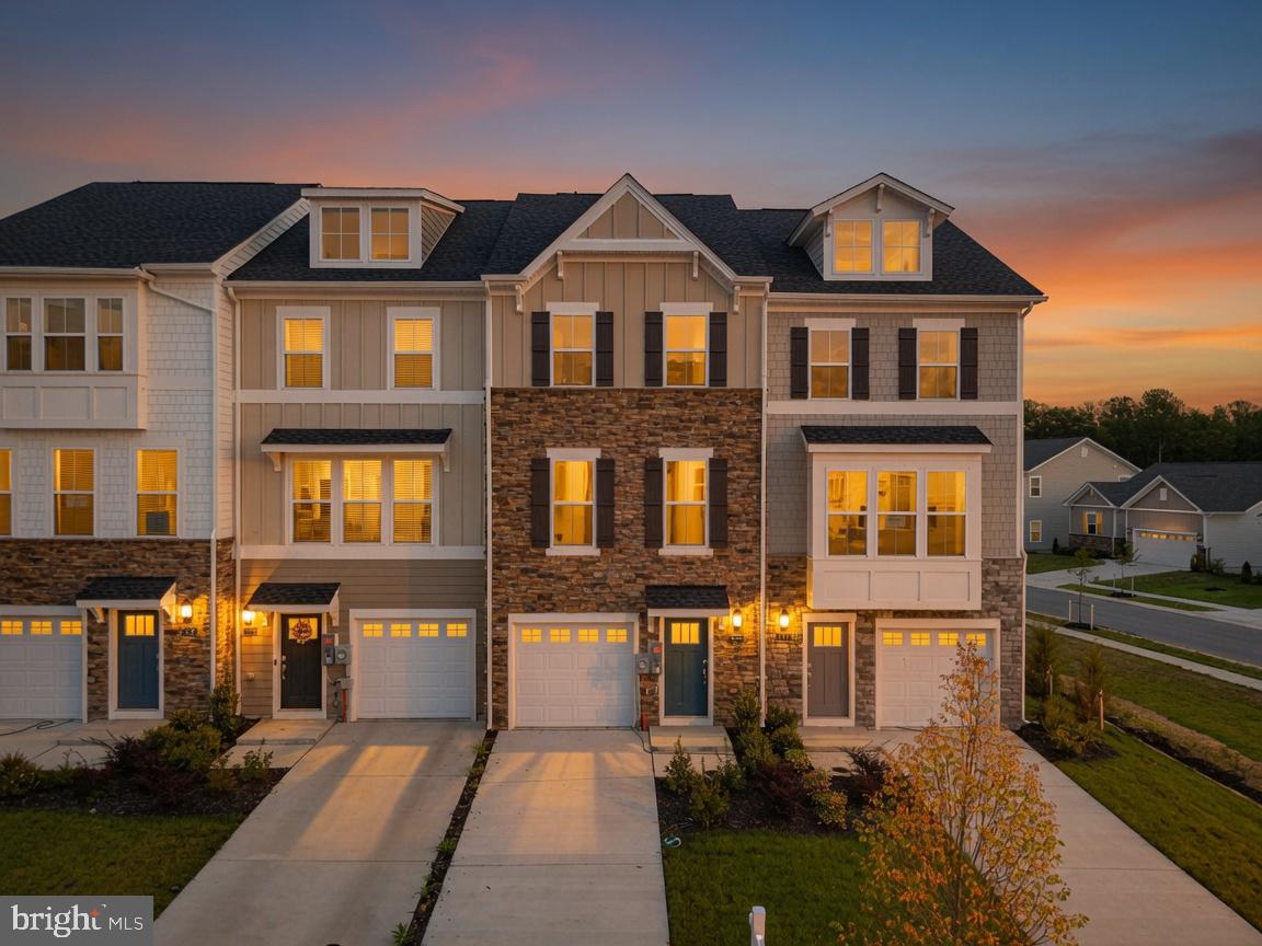 Welcome to the sought-after Highlands at St. Charles, where modern comfort, thoughtful design, and everyday convenience come together in this move-in ready Baylor floor plan townhome. This beautifully maintained three level interior residence features 2 spacious bedrooms, 3 full bathrooms, and 1 half bath, offering a flexible layout designed to fit a variety of lifestyles. The entry level welcomes you with a versatile bonus space just off the foyer, complete with a full bath perfect for a guest suite, home office, fitness area, recreation room, or additional living space. The main level offers a bright, open concept design ideal for both entertaining and everyday living. The sun-filled family room flows effortlessly into the stylish kitchen, complete with stainless steel appliances, a center island, and a dedicated breakfast area. Step outside to the private deck, the perfect spot for morning coffee, outdoor dining, or relaxing at the end of the day. A convenient powder room completes the main level. Upstairs, you’ll find two generously sized bedrooms, including an impressive primary suite featuring vaulted ceilings, a walk-in closet, and a spa-inspired en-suite bath with dual vanities. An additional full bath and upper-level laundry area with washer and dryer add comfort and convenience. Residents of the Highlands at St. Charles enjoy access to outstanding community amenities, including a clubhouse, fitness center, swimming pool, playground, and dog park. Don’t miss the opportunity to own this beautifully designed home in one of Southern Maryland’s most desirable communities. Schedule your private showing today!