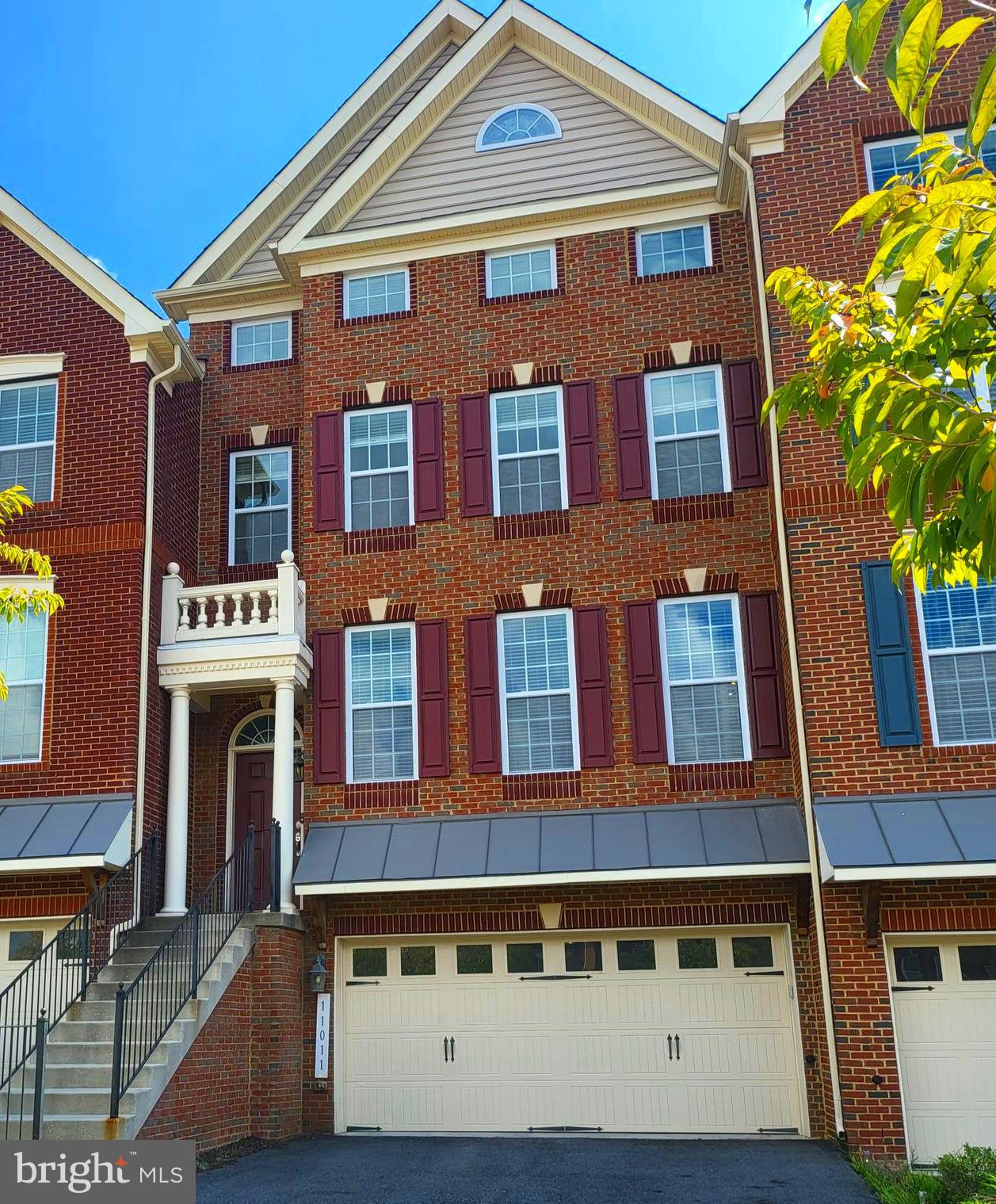 UNDER CONTRACT Total square feet 4416.   HOA fee $231 per month. This is your spacious and beautifully designed 4-story Toll Brothers Townhome! This 4-bedroom,  4.5-bathroom home is the largest floorplan offered in the illustrious Marlboro Ridge community, just thirteen miles from the Nation’s Capital. This home is more spacious than many average single-family homes with 4 generously-accommodating levels including two 8-foot bump-outs and a fully finished attic level - a rare find in this community. Upon encountering the main level you’re greeted with glistening hardwood floors and a formal living room with a cathedral ceiling that opens up to the formal dining room beautifully lit with natural sunlight through large windows.  Be greeted with warmth in this open floor plan as you approach an inviting kitchen with multiple 42-inch cabinets, an expansive island, designer granite counters, and a double wall oven for cooking and hosting. Continue to a large family room and breakfast area leading to a spacious deck with a pergola for entertaining! The basement level hosts a 2-car garage and a large bonus space that can be used as a den, office, game room, or 5th bedroom. The basement also has a full bath and opens to a fenced rear yard with a brick patio and grass area. Not to be outdone, Level 3 hosts the incredibly intimate owner’s suite with 2 walk-in closets with space-saving built-ins already installed, a large soaking tub, and a cozy sitting room with vaulted ceilings. There are two additional bedrooms and a full bath on this level. Yes, there is a 4th level that hosts a large bedroom with a vaulted ceiling and a skylight. This room is flexible and can be used as the 4th bedroom, theatre room, bonus, game, or office space, and includes a full bath. The prominent Marlboro Ridge community features desirable resort-style amenities: a clubhouse and pool, extensive walking and hiking trails, playgrounds, a state-of-the-art equestrian center, a riding arena, and more. Close to Metro, easy access to several military bases, Washington DC, VA, and The National Harbor. Appointment Required for viewing. This relocation file will require a quick third-party approval.  The washer and dryer can be conveyed based on the offer.