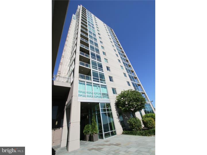 Luxury Waterfront Square Condo with majestic Northern river views. 2 bedroom, 1.5 bath condo with 1 car deeded garage parking included. Upgrades include wood floors, California closet organizers, and a STORAGE LOCKER on the same floor. The kitchen boasts all stainless-steel appliances. In-unit Bosch washer and dyer included. The walk-out private balcony with multi-room access offers river views, and the floor-to-ceiling windows in the living room allow for abundant natural light. Condo fees include all Waterfront Square amenities such as a state of the art gym, huge indoor pool, river deck, green space, walking trails, and shuttle bus to accommodate your trips to Center City. Valet parking included and additional guest parking available on site. Tax abatement until October 2016.