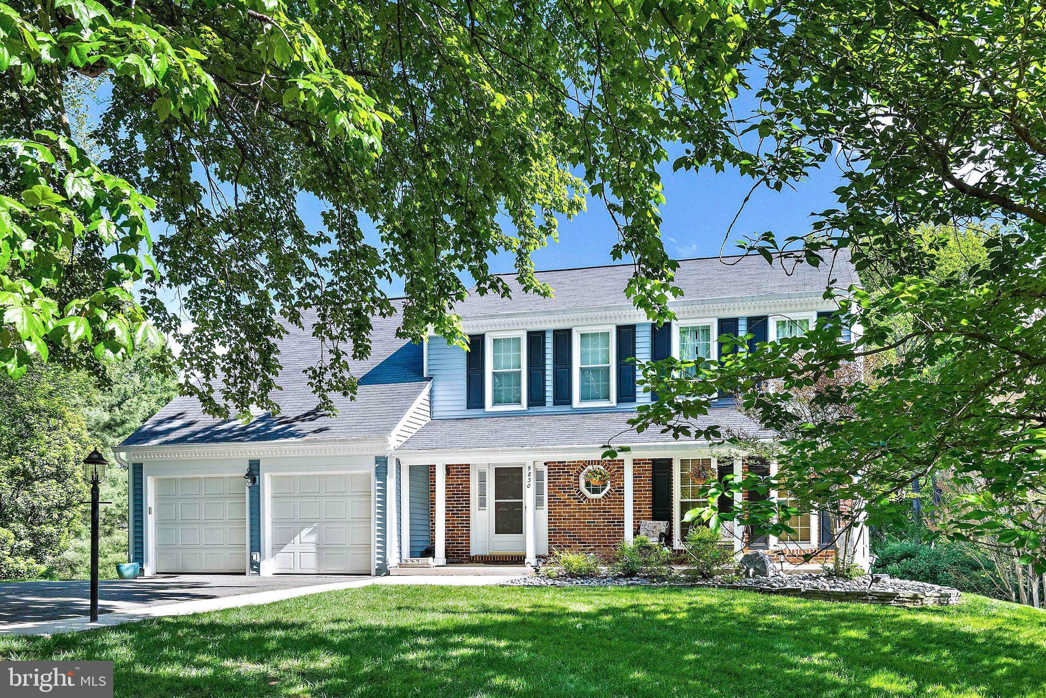 Welcome to 9830 Faust Drive in Vienna's Wolftrap Meadows. This beautiful traditional Colonial is nestled on a pristine one-acre lot backing to a lush conservation area, offering a rare level of privacy and tranquility.

Designed for both entertaining and comfort, the main level features hardwoods, custom plantation shutters, and a seamless flow. A unique billiards room sits off the foyer, leading to a formal dining area with French doors opening to the deck. The chef’s kitchen, anchored by an enormous granite island, truly defines open-concept living, flowing effortlessly into a soaring two-story family room centered by a magnificent stone floor-to-ceiling fireplace facade and bright skylights.

The true highlight of this home is the expansive, climate-controlled four-season sunroom. Accessed via French doors from both the kitchen and family room for a seamless transition, this spectacular addition dramatically increases the main-level living space. The sunroom’s flexible footprint easily accommodates multiple social layouts—including distinct dining, lounging, and conversation areas—all set against a panoramic wooded backdrop.

The second story features a primary suite and two additional spacious bedrooms. The versatile loft/flex space overlooks the family room below; currently used as a home office, it offers the footprint and walk-in closet to be easily enclosed for a private fourth upper-level bedroom.

The bright, walk-out basement includes a recreation room, guest bedroom, full bath, and large laundry room. Step outside to the large brick patio to enjoy breathtaking views of the sprawling lot. 

Additional highlights include its prime location within the desirable Westbriar, Kilmer, and Marshall school pyramid and its proximity to the Fairfax County Cross County Trail, which seamlessly connects to the W&OD trails for outdoor enthusiasts. This home offers the perfect balance of seclusion and convenience with quick access to the Dulles Toll Road, Leesburg Pike, and Rt 123.