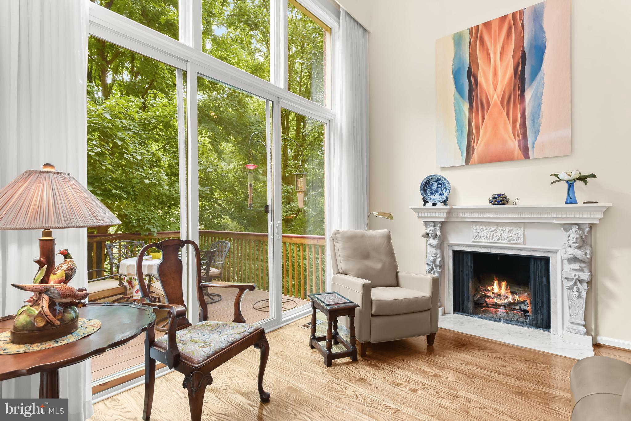 Terrific townhouse in super convenient location, on quiet block just off Goldsboro Road with easy access to DC and downtown Bethesda.  Large sunny rooms with high ceilings and huge windows, elevator serving three levels, two car garage opening directly into the house.   On the main floor are bright, spacious living and dining rooms opening to a charming deck, an eat-in kitchen, and a comfortable den or office with its own outdoor space. Upstairs are two generous master bedroom suites (one with universal design shower) and an open office area; the expansive lower level has a large family room with high ceiling and walkout to private covered porch, bedroom, and full bath  -- great for guests or visiting adult children.   Large lower level storage room plus great closets throughout.