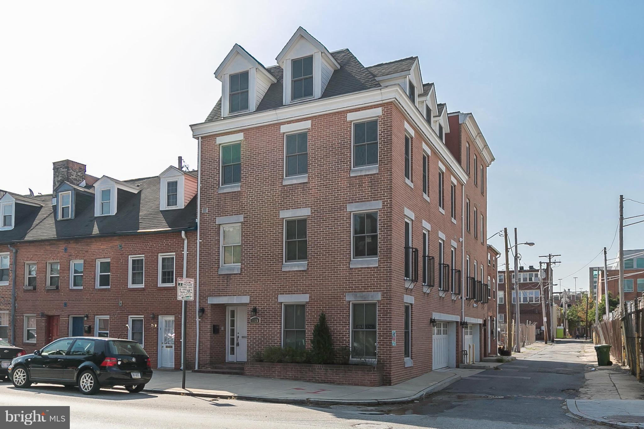 In the heart of everything! 2 blocks from Fells Point waterfront, 2 blocks from Harbor East with 2 car GARAGE! This 2008 rehab is over 3100 sq ft, it features two generous bedrooms with full baths and upper level laundry and a large master suite with jetted tub & glass shower. Huge, sun-filled, open living area with vaulted ceilings and gourmet kitchen.