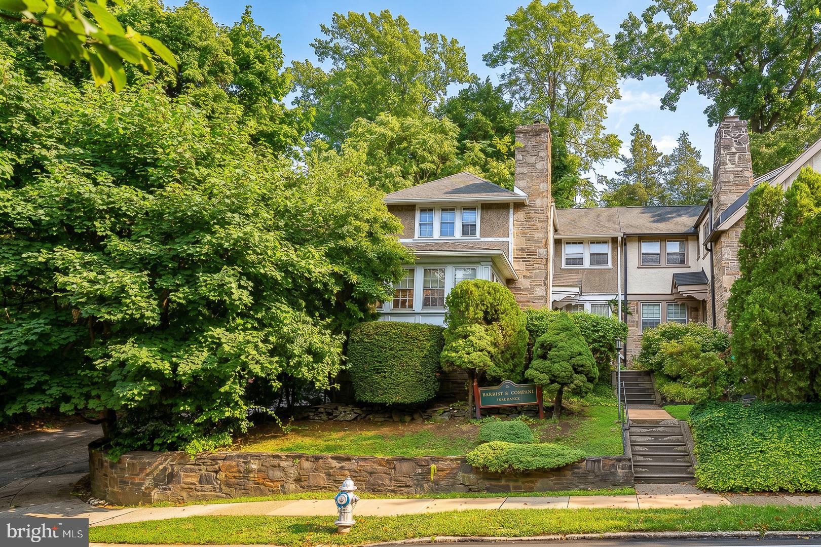 Rare mixed-use opportunity in the heart of Bala Cynwyd! Located at 40 Rock Hill Road, this approximately 1,600-square-foot end-unit townhome offers exceptional flexibility for residential, commercial, or live/work use. Currently configured as professional office space, the property is ideally suited for a business owner seeking a highly visible location, a buyer looking to create a convenient home office, or someone ready to convert it back into a charming residence. The main level features a welcoming living room with a fireplace, a bright sunroom, a formal dining room, and a kitchen, providing a layout that easily adapts to a variety of uses. The second floor offers three spacious rooms currently utilized as offices, along with two half bathrooms, creating an ideal workspace or the framework for future residential living. An added bonus is the private side parking area with space for approximately 15 vehicles, a rare amenity in this desirable location. Situated just minutes from I-76 and Center City Philadelphia, the property is also within walking distance of Wawa, CVS, local shops and restaurants, and the scenic Cynwyd Heritage Trail. Award winning Lower Merion Township Schools.  Whether you are searching for office space, a live/work property, an investment opportunity, or a home with exceptional flexibility, 40 Rock Hill Road offers endless possibilities in one of the Main Line's most convenient locations.