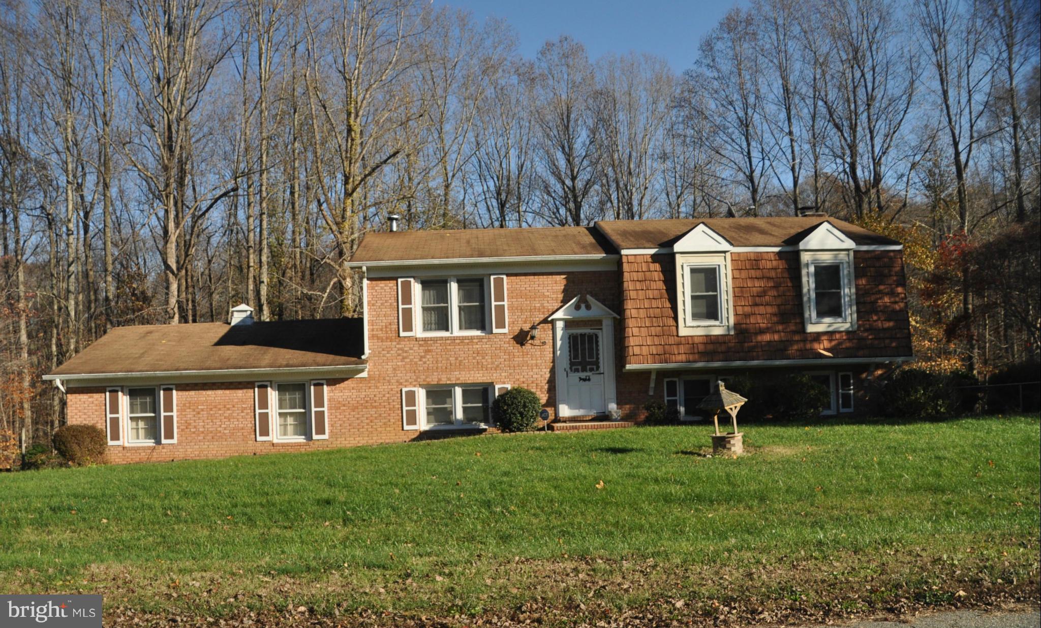 Spacious home on quiet cul de sac in No. St. Marys County. Convenient to Pax Rvr NAS, Waldorf & commute to DC.  Large country kitchen, good sized rooms throughout, finished bmnt w/masonry Fireplace w/wood stove insert. A little over an acre of land w/fenced back yard that backs to trees. Spacious 2 car garage. Seller giving $10,000 flooring allowance - a little updating will make this place shine!
