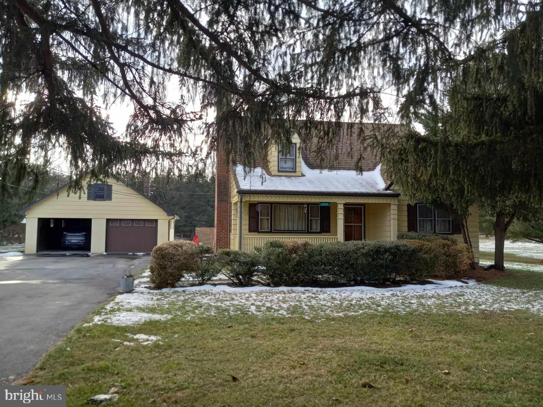 This home was built in the 1950's with family in mind and it has remained in the same family for over 60 years. The home has beautiful wood walls and floors made of knotty pine, real wood doors, and stained trim. The upper level room as you walk up the stairs has been used as a bedroom (#4) but would be a great office space too! 
The detached 2 car garage (27'x 28') has a heated workshop built onto the back of it (21' x 22') with 110 & 220 outlets for power tools.  There are two storage buildings for lawn and garden equipment, hand tools, and, more. 1 building is 12x16ft. located beside the garage and 1the other is 12x12ft. located beside the back porch/deck area.  
Centrally located, you can be in Inwood or Charles Town in minutes with good access to Rt. 81, North & South and Rt.9 East & West 
Rt. 7 to Virginia is approximately 20-25 minutes away, with good access Berryville, Va. and Winchester, Va. 
The property has two adjacent lots parceled individually with no HOA or restrictions.