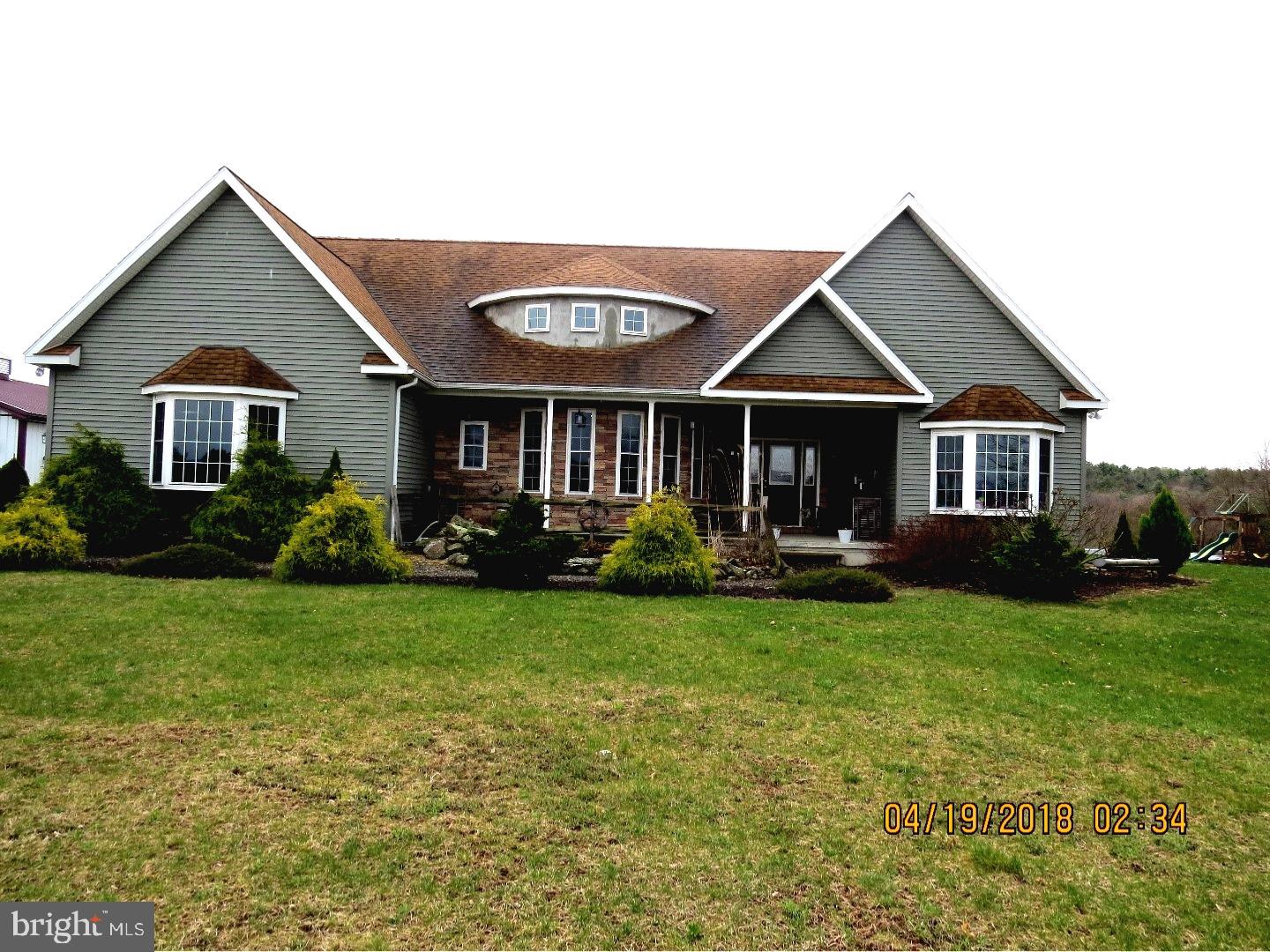 Welcome home!! Charming custom built ranch home on over 4 acres with open floor plan, attached 2 car garage and additional 30 x 32 pole building! This home offers bamboo hard wood flooring, ceramic tile, wrap around deck, covered patio for backyard entertainment, above ground pool with deck, master suite with walk in closet, plenty of cabinet space, and dining area. Garage has radiant heated flooring. Home has gas heat and cooling with 5 separate zones. Walk out basement was partially finished and with the high ceilings it allows for easy finish. Built 8 years ago with lifetime windows and all appliances remain!! Pine Grove Area School District.