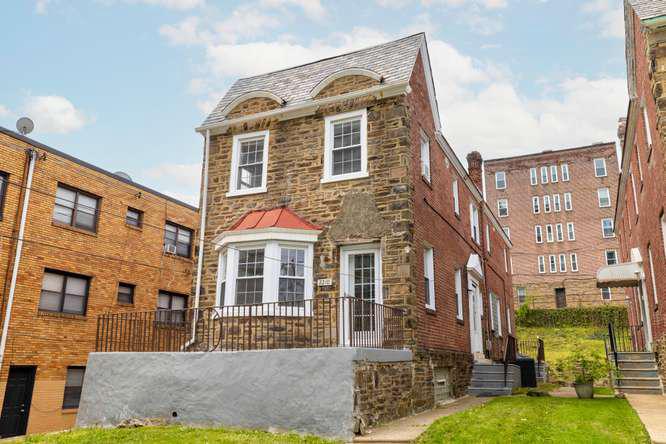 Discover a standout investment opportunity in the heart of the Wynnefield neighborhood of West Philadelphia. This charming 1925 traditional home offers 6 spacious bedrooms and 4.5 bathrooms, providing exceptional flexibility for rental income or multi-generational living. A fully finished basement expands the possibilities even further—ideal for additional living space, a private suite, or a potential rental unit. Practical features include an attached garage and additional on-street parking, offering the convenience that today’s renters value. Freshly painted, the property blends timeless architectural charm with strong upside potential. Located in a desirable neighborhood with consistent rental demand, this property presents a rare opportunity to generate income while building long-term equity. Whether you’re looking to expand your portfolio or secure a versatile living arrangement, this home delivers on both comfort and financial potential. Do not miss the chance to invest in a property that offers space, character, and opportunity in one of Wynnefield's most sought-after locations.