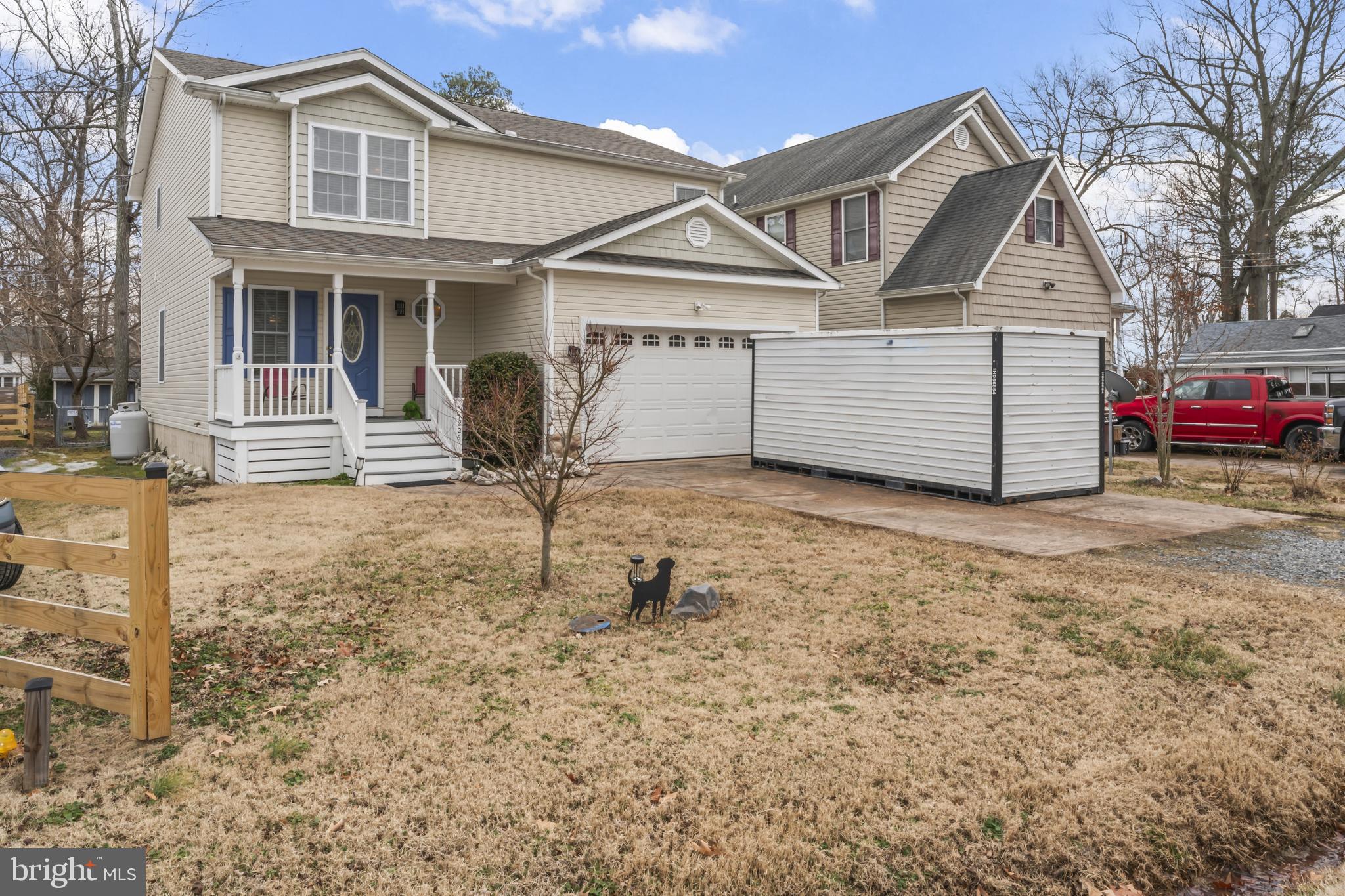 PRICE IMPROVEMENT! ASSUMABLE 2.5% LOAN AVAILABLE FOR QUALIFIED BUYERS—an incredible opportunity to secure a below-market interest rate while enjoying one of Colonial Beach’s most desirable neighborhoods.

Welcome to The Point, Colonial Beach’s vibrant golf cart community where coastal charm, waterfront living, and small-town hospitality come together. Just two blocks from both the Potomac River and Monroe Bay, you’ll enjoy easy access to beaches, marinas, waterfront restaurants, boutique shopping, breweries, the boardwalk, and year-round community events—all just a golf cart ride away.

Built in 2009, this beautifully maintained 3-bedroom, 2.5-bath home offers exceptional space rarely found in this location. The expansive living room addition creates incredible flexibility for entertaining, a second family room, formal dining, a game room, or a home office. Hardwood floors, a cozy propane fireplace, and an open, inviting floor plan make this home ideal for everyday living.

The recently updated kitchen and bathrooms blend timeless style with modern finishes. Upstairs, the oversized primary suite features a walk-in closet and a relaxing jetted soaking tub.

Outside, enjoy the low-maintenance Trex front porch, screened rear porch, oversized fenced yard, and oversized two-car garage with plenty of room for storage, hobbies, or your golf cart. Best of all—there’s no HOA.

Whether you’re searching for a full-time residence, a weekend retreat, or an investment in one of Virginia’s favorite waterfront towns, this home offers a rare combination of location, lifestyle, space, and financing opportunities.

Schedule your private showing today and discover why so many people fall in love with life in Colonial Beach.